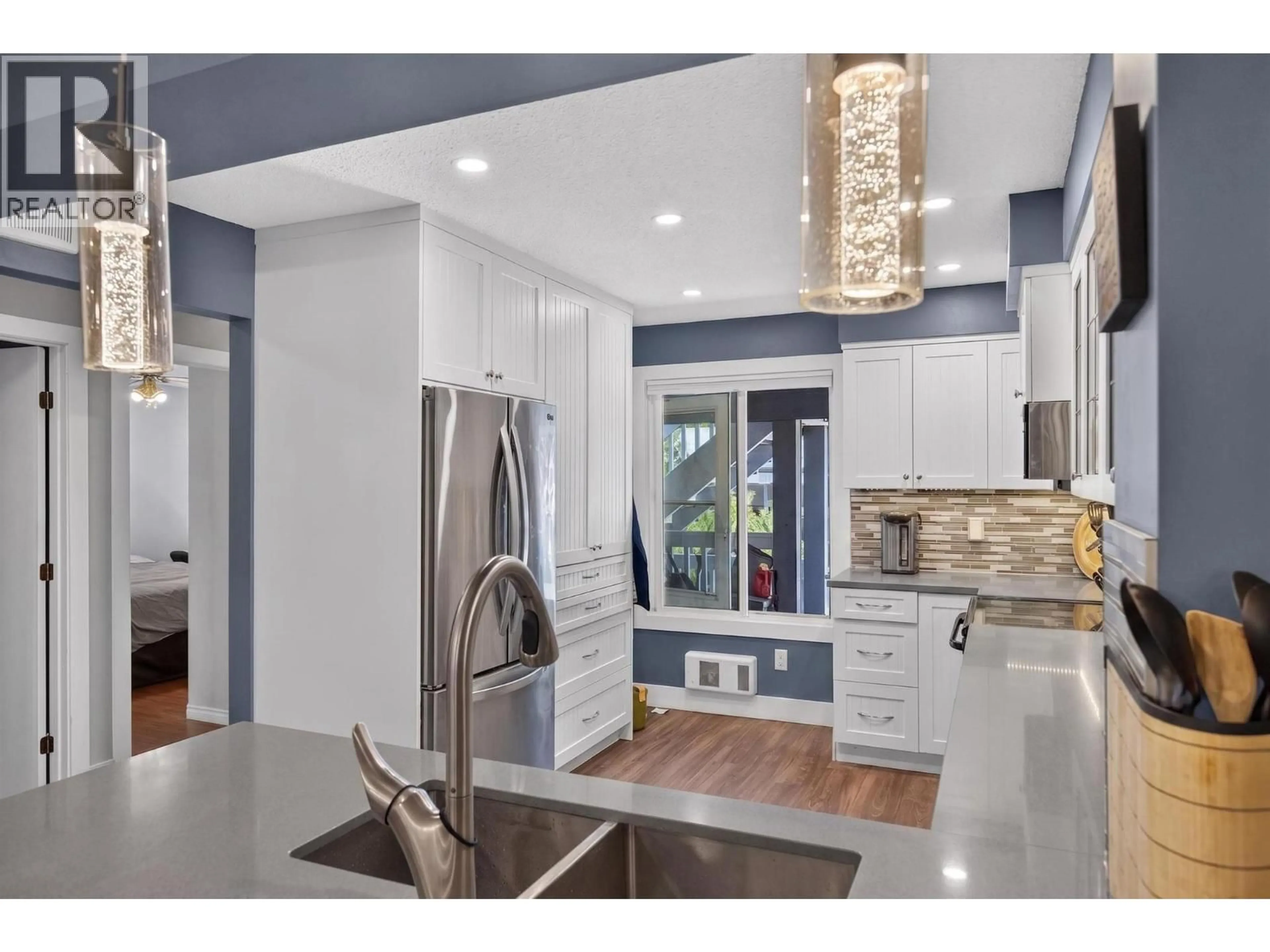 Dining room, wood/laminate floor for 9 - 3000 RICHTER STREET, Kelowna British Columbia V1Y8M5
