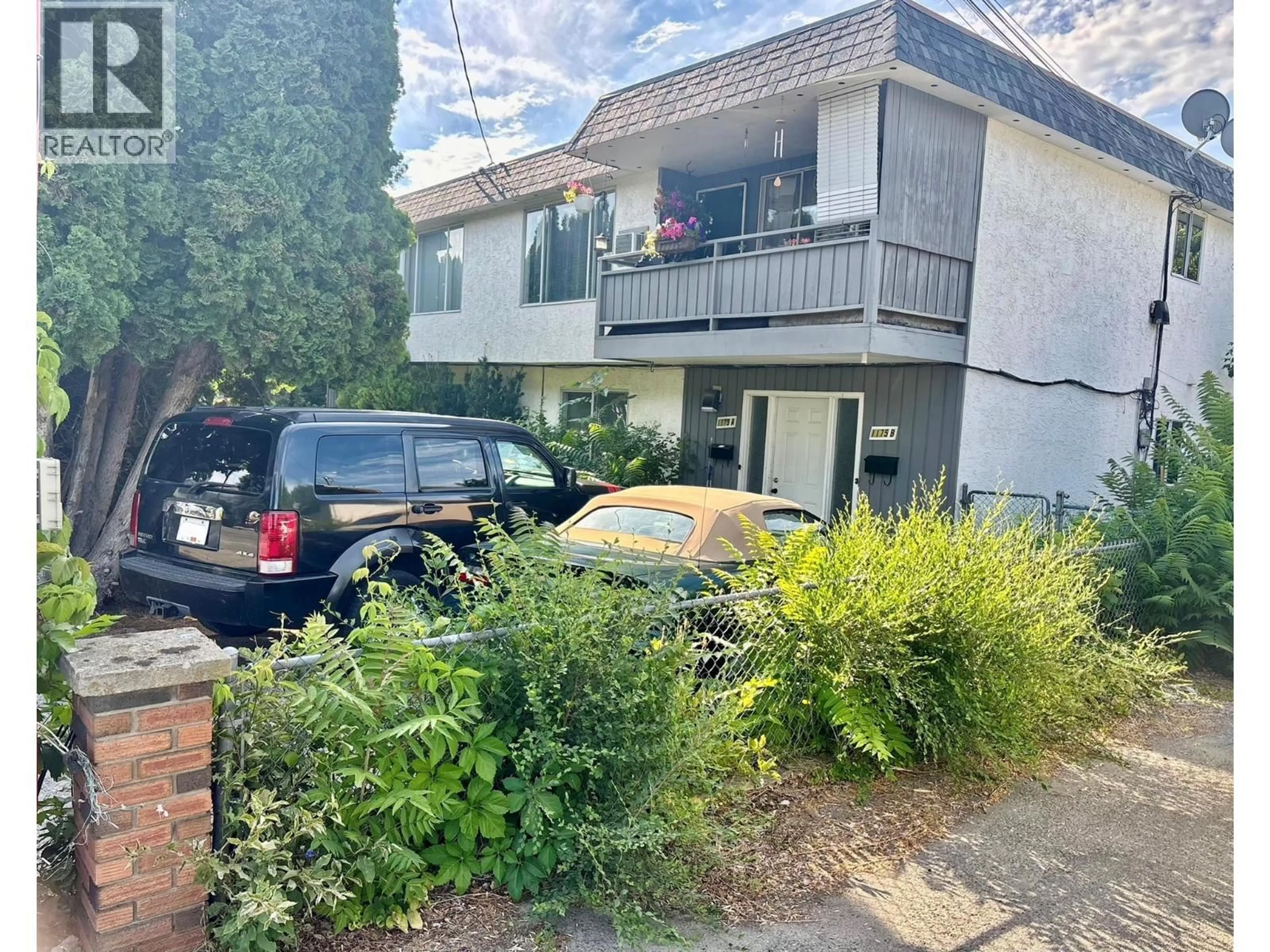 A pic from outside/outdoor area/front of a property/back of a property/a pic from drone, street for 1175-1179 RAYMER AVENUE, Kelowna British Columbia V1Y4Z7