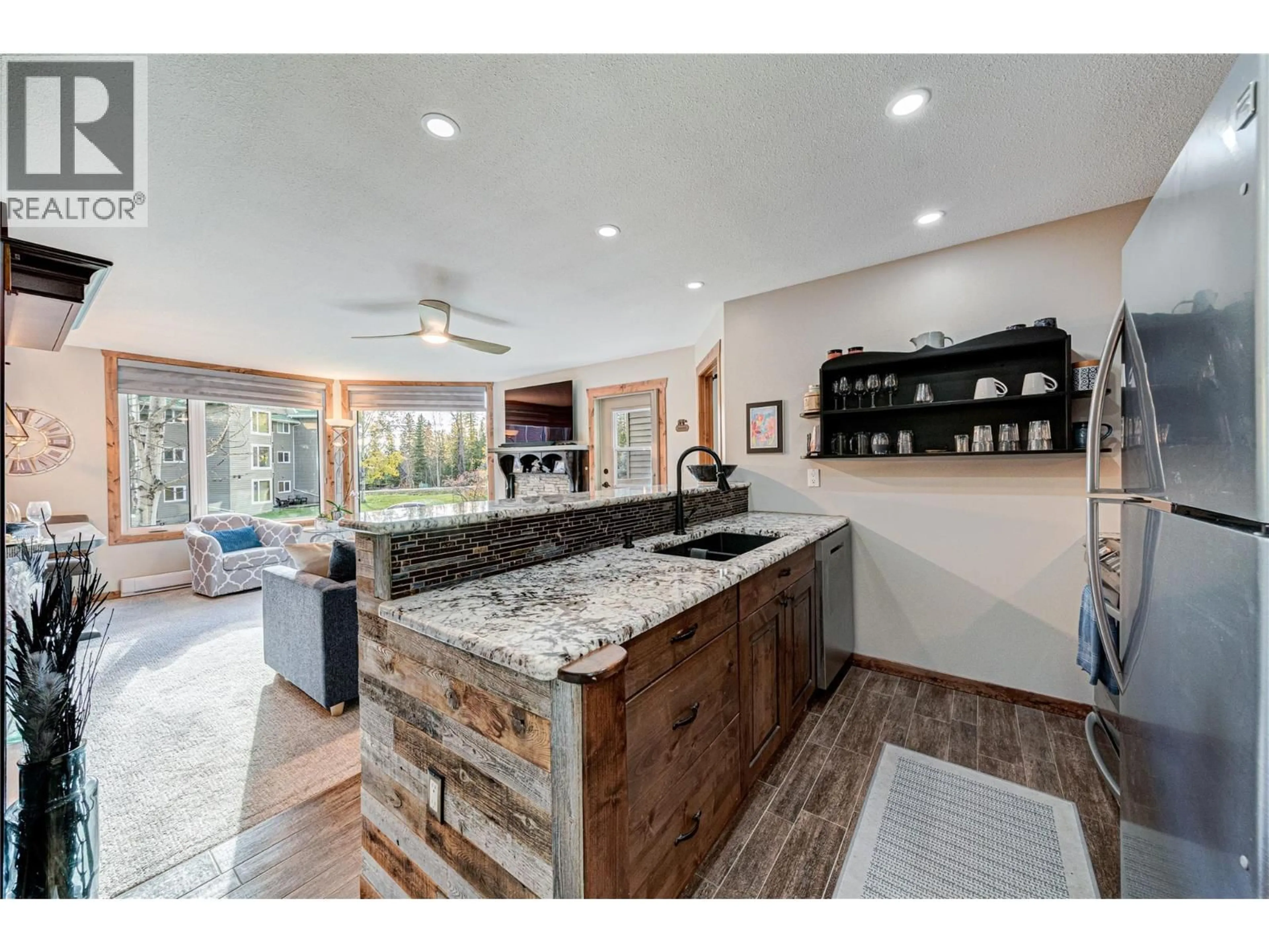 Open concept kitchen, ceramic/tile floor for 221 - 7559 TIMBERLINE CRESCENT, Fernie British Columbia V0B1M6