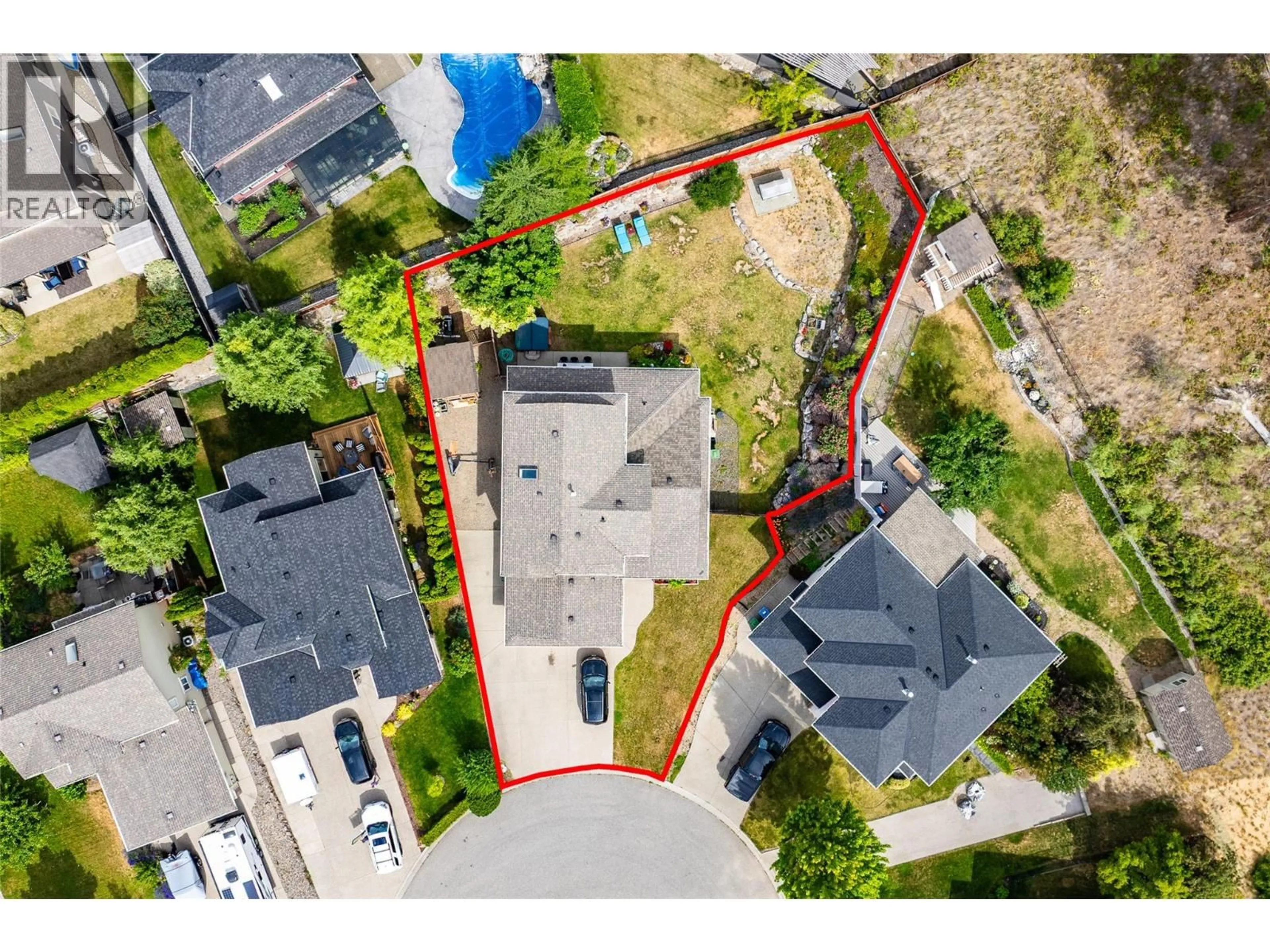 A pic from outside/outdoor area/front of a property/back of a property/a pic from drone, street for 2034 ROSEWOOD COURT, West Kelowna British Columbia V1Z4B5