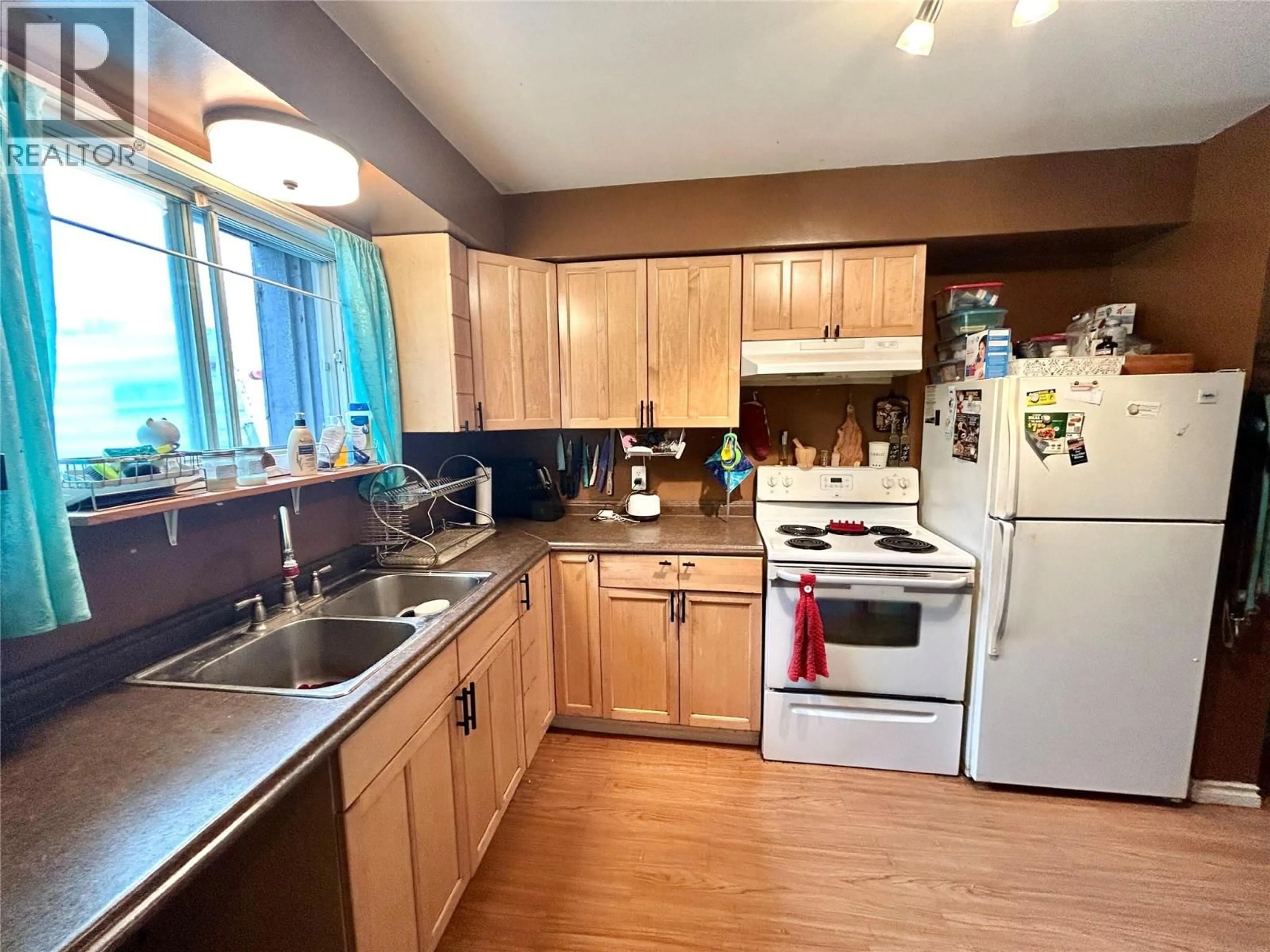 Standard kitchen, wood/laminate floor for 248 SPIEKER AVENUE, Tumbler Ridge British Columbia V0C2W0