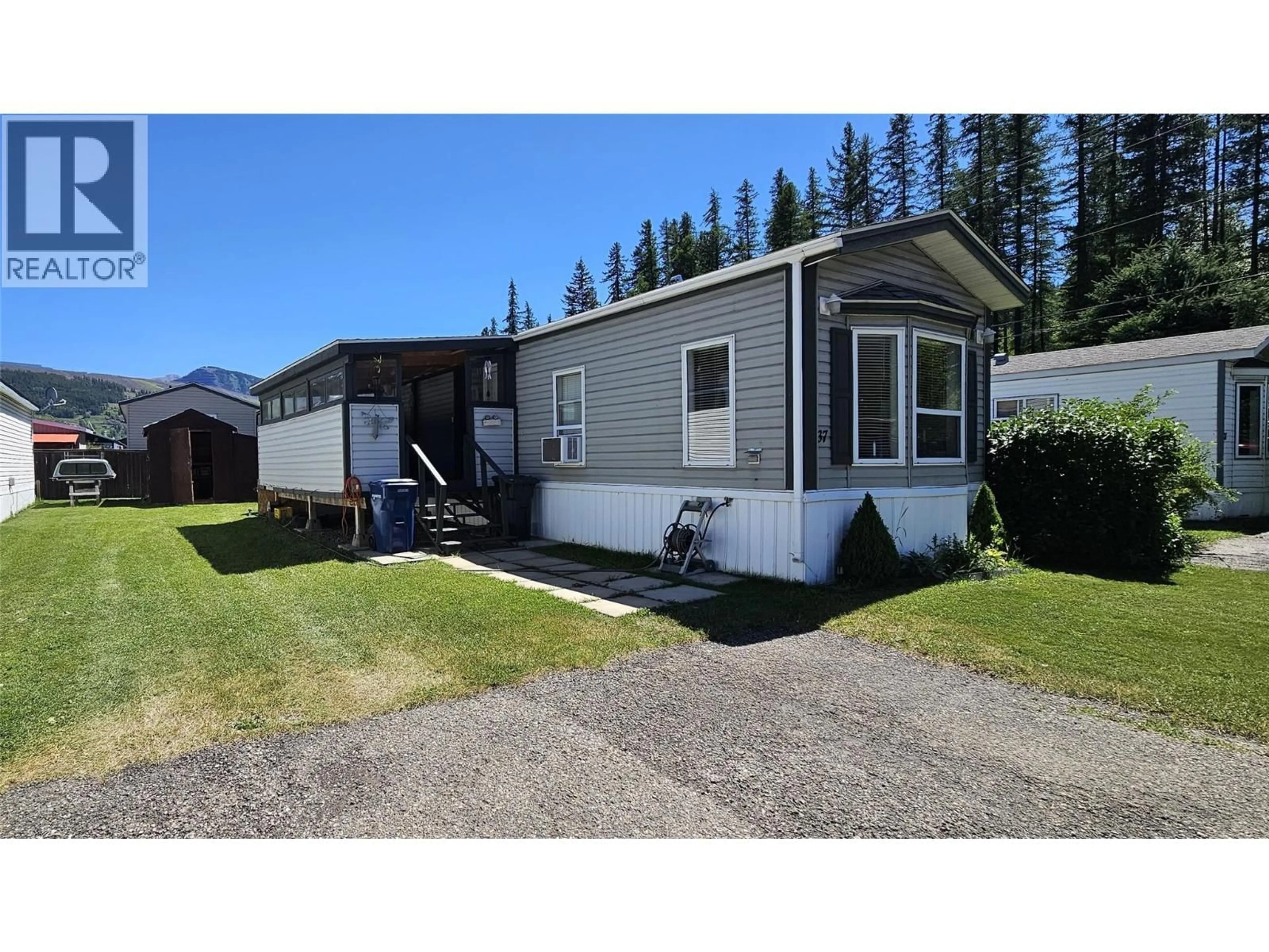 Home with vinyl exterior material, street for 37 - 100 ASPEN DRIVE, Sparwood British Columbia V0B2G0