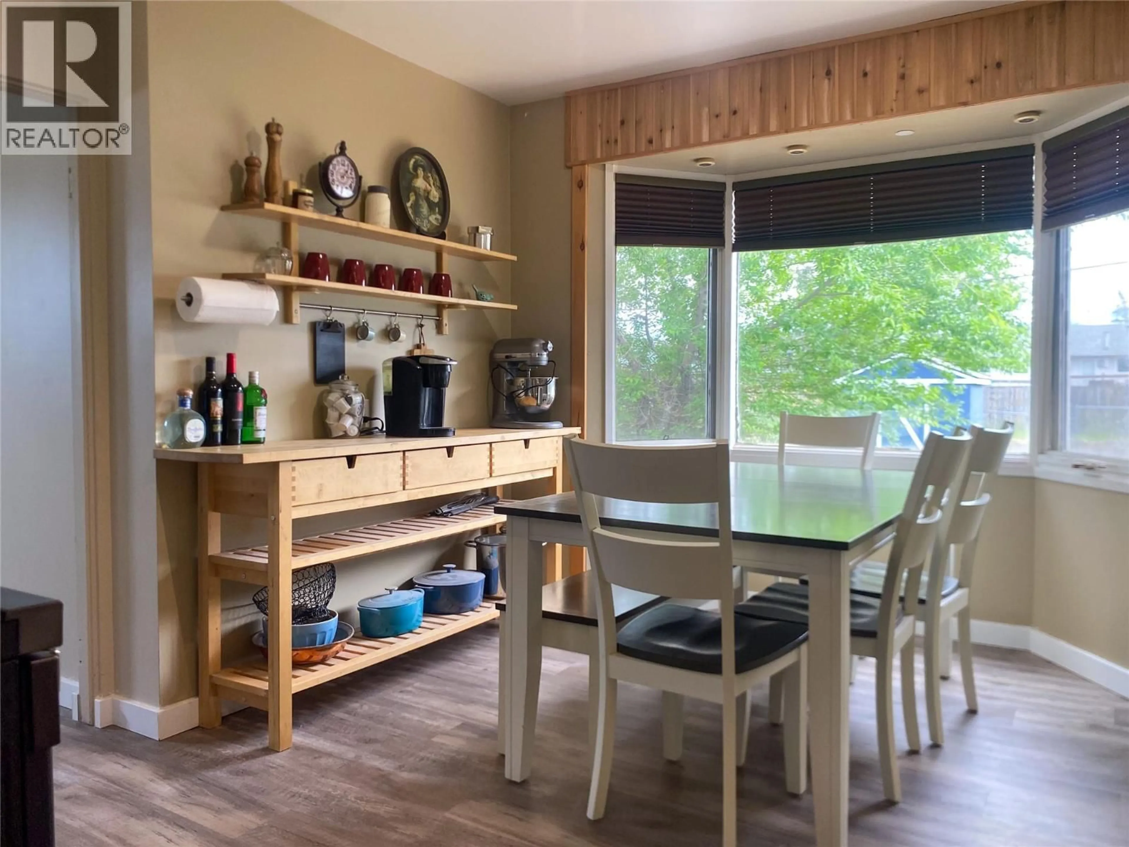 Dining room, wood/laminate floor for 849 111 AVENUE, Dawson Creek British Columbia V1G2X1