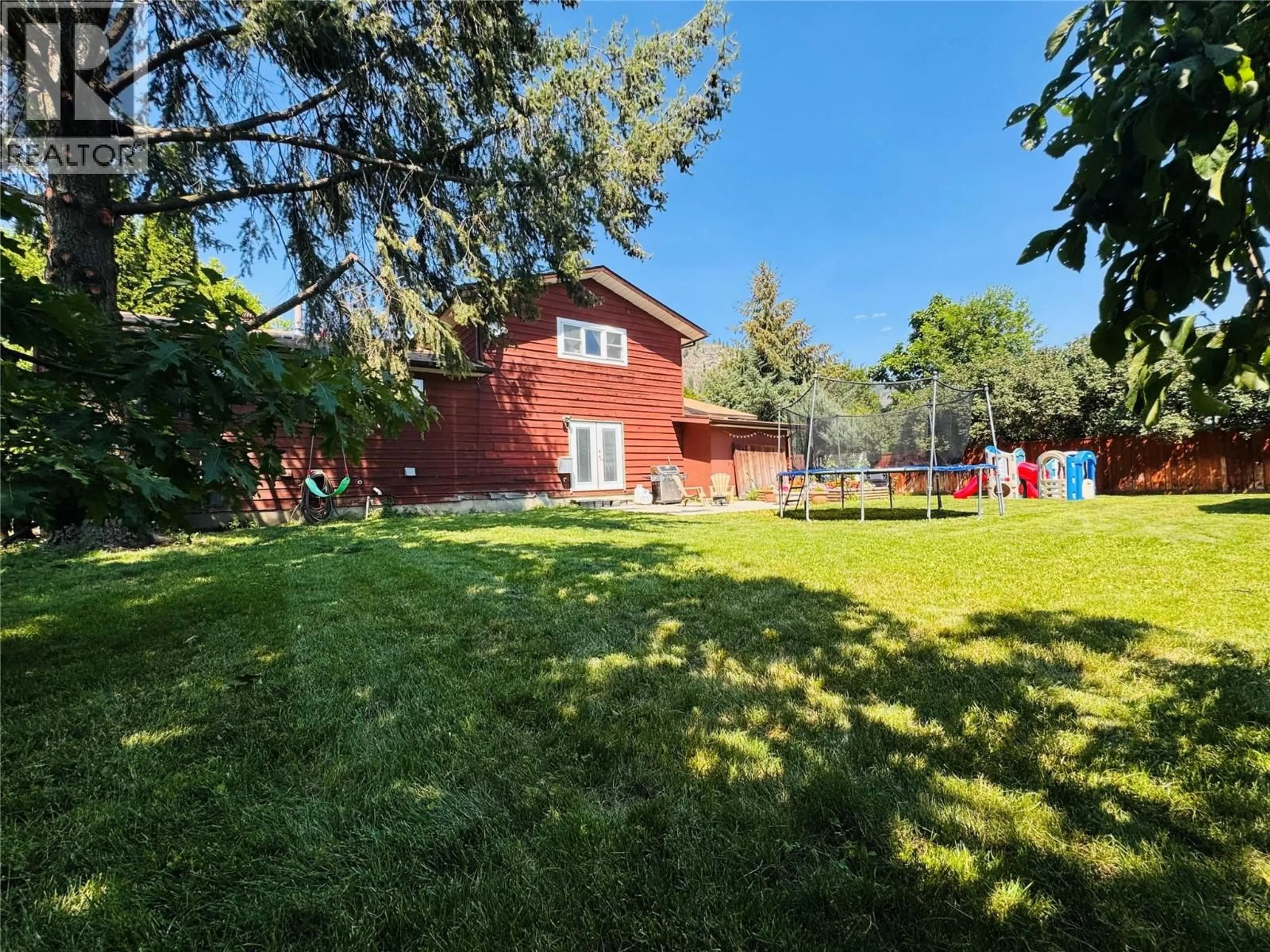A pic from outside/outdoor area/front of a property/back of a property/a pic from drone, unknown for 1524 77TH AVENUE, Grand Forks British Columbia V0H1H0