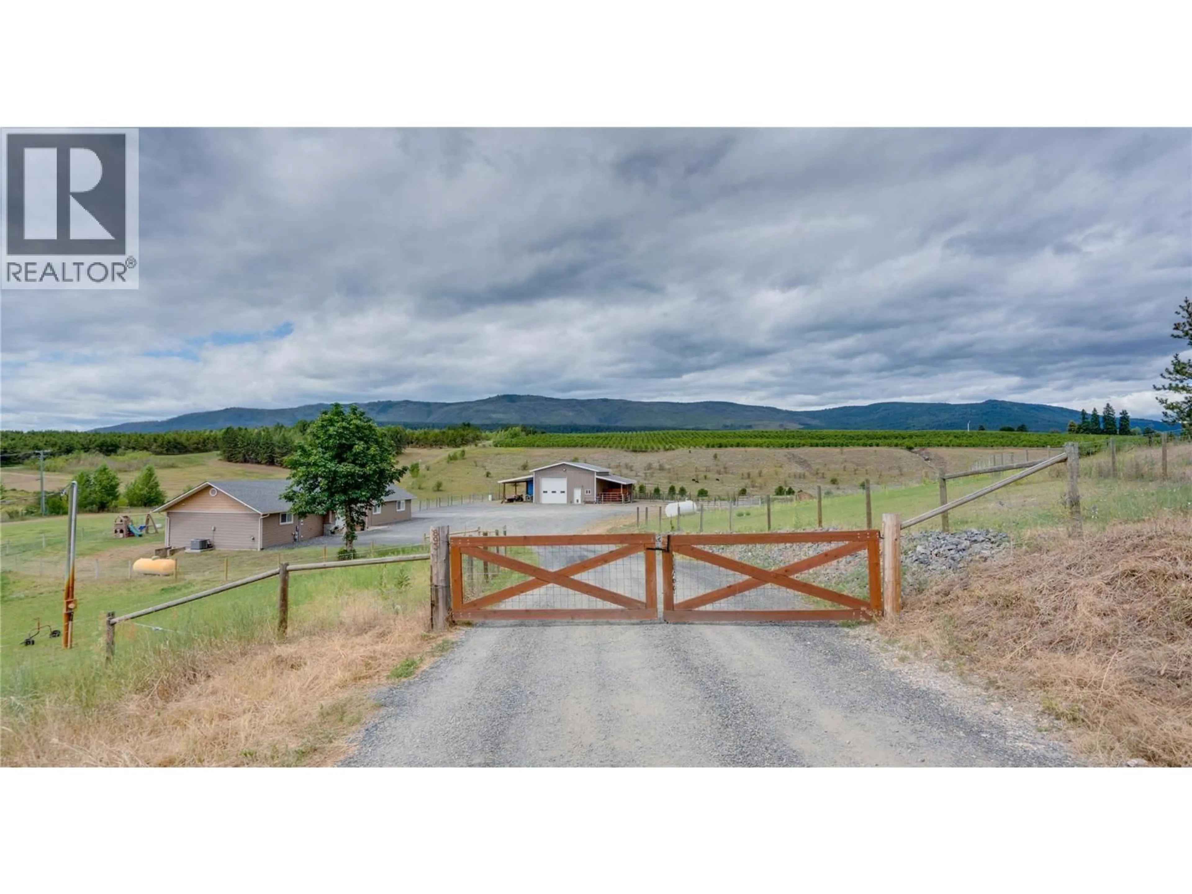 A pic from outside/outdoor area/front of a property/back of a property/a pic from drone, mountain view for 893 EVANS ROAD, Spallumcheen British Columbia V4Y0P6