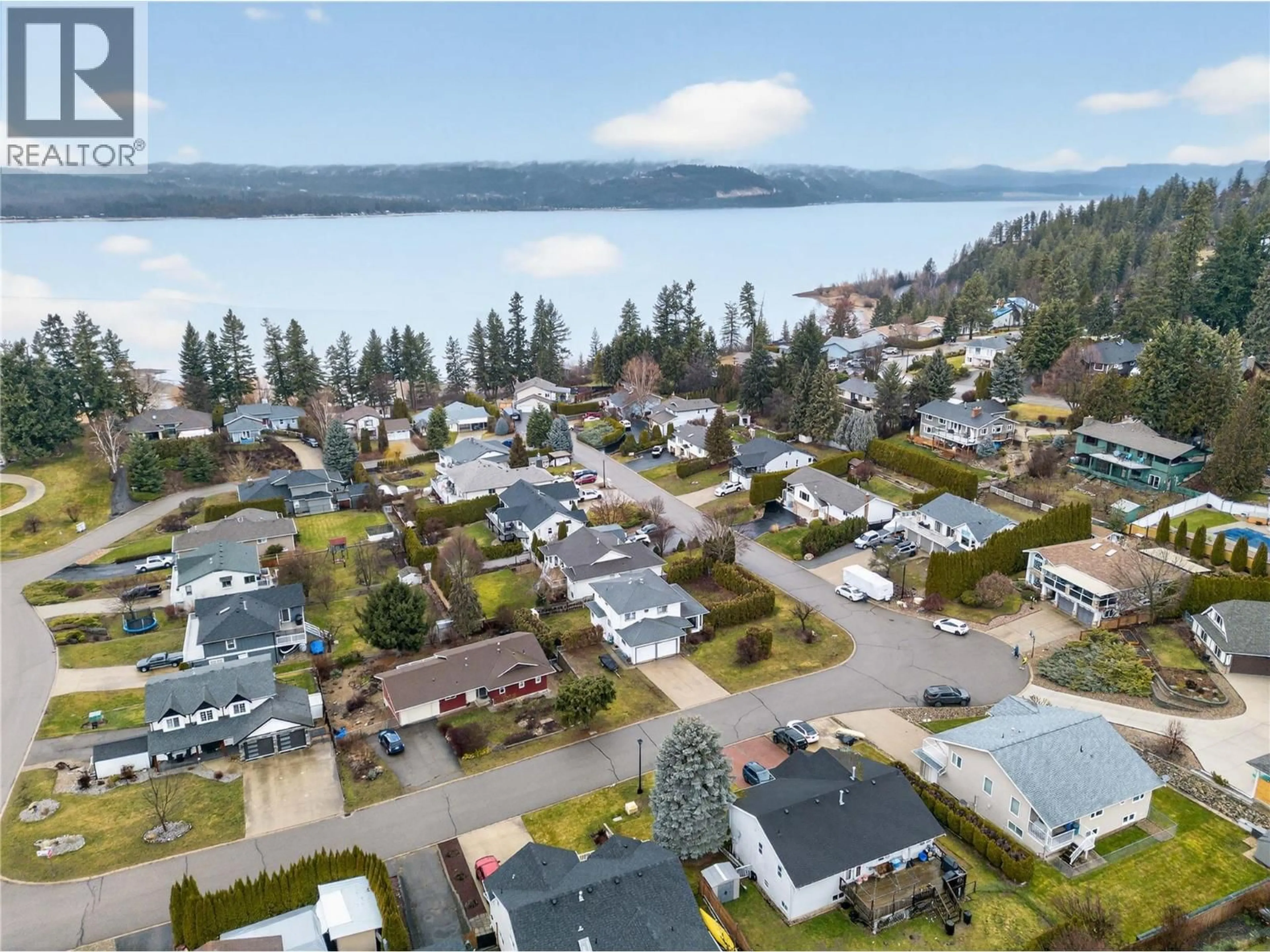 A pic from outside/outdoor area/front of a property/back of a property/a pic from drone, water/lake/river/ocean view for 4851 13 STREET NORTHEAST, Salmon Arm British Columbia V1E3P1