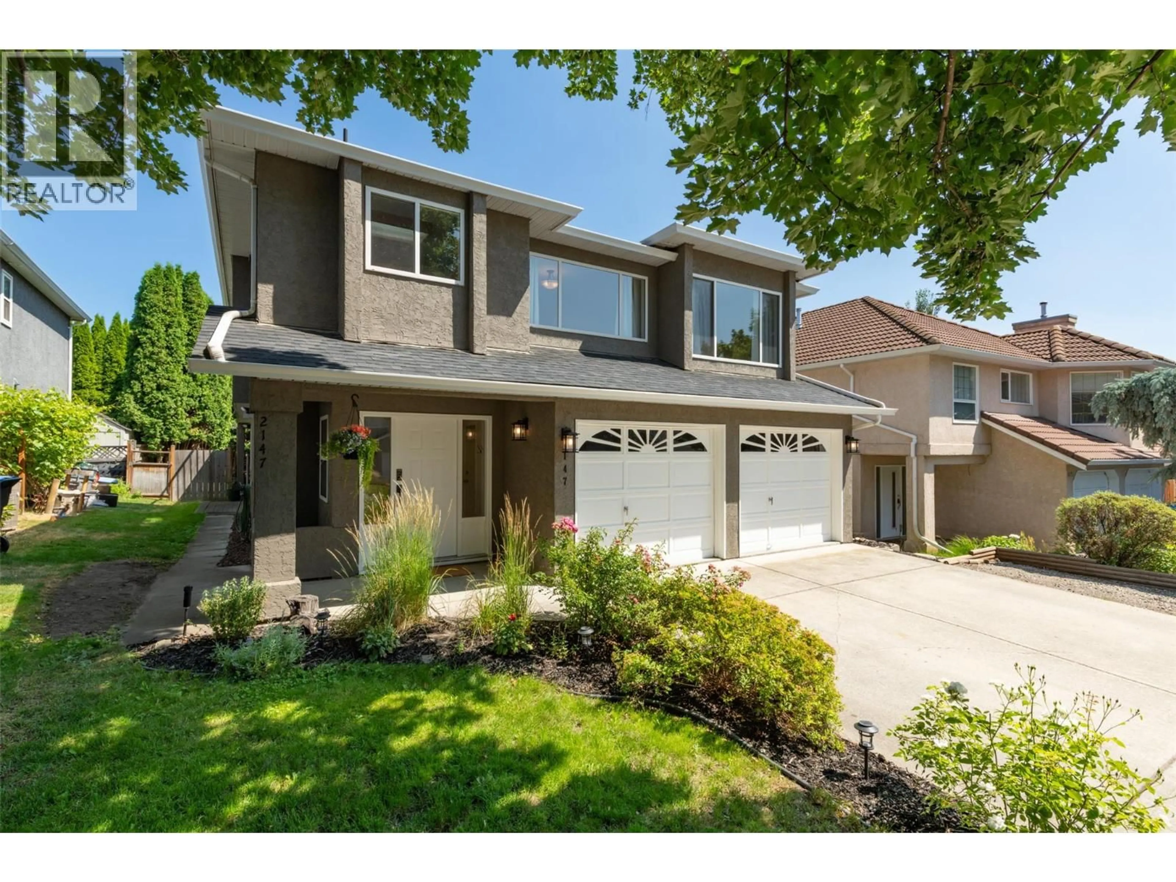 Home with brick exterior material, street for 147 SUMMERHILL PLACE, Kelowna British Columbia V1P1M8