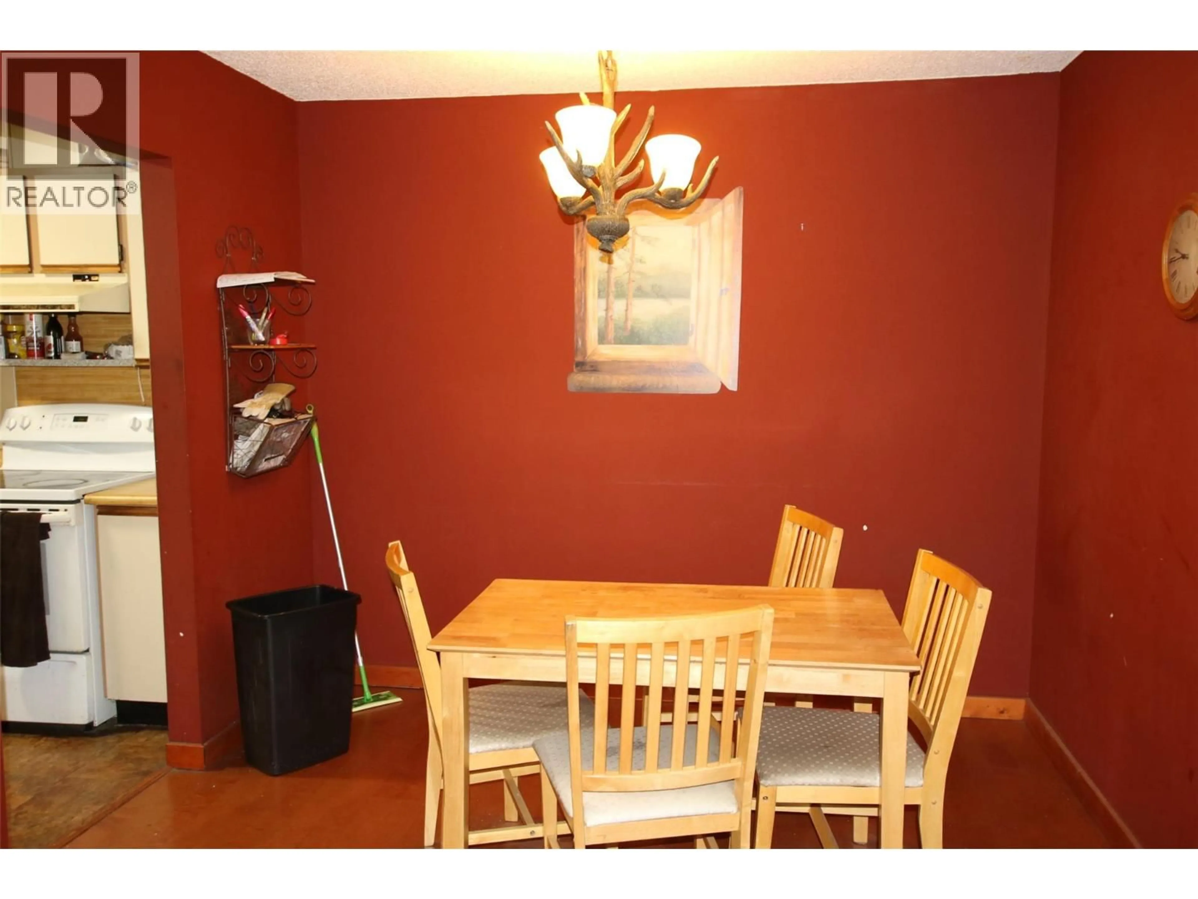 Dining room, wood/laminate floor for 206 - 195 CHAMBERLAIN CRESCENT, Tumbler Ridge British Columbia V0C2W0