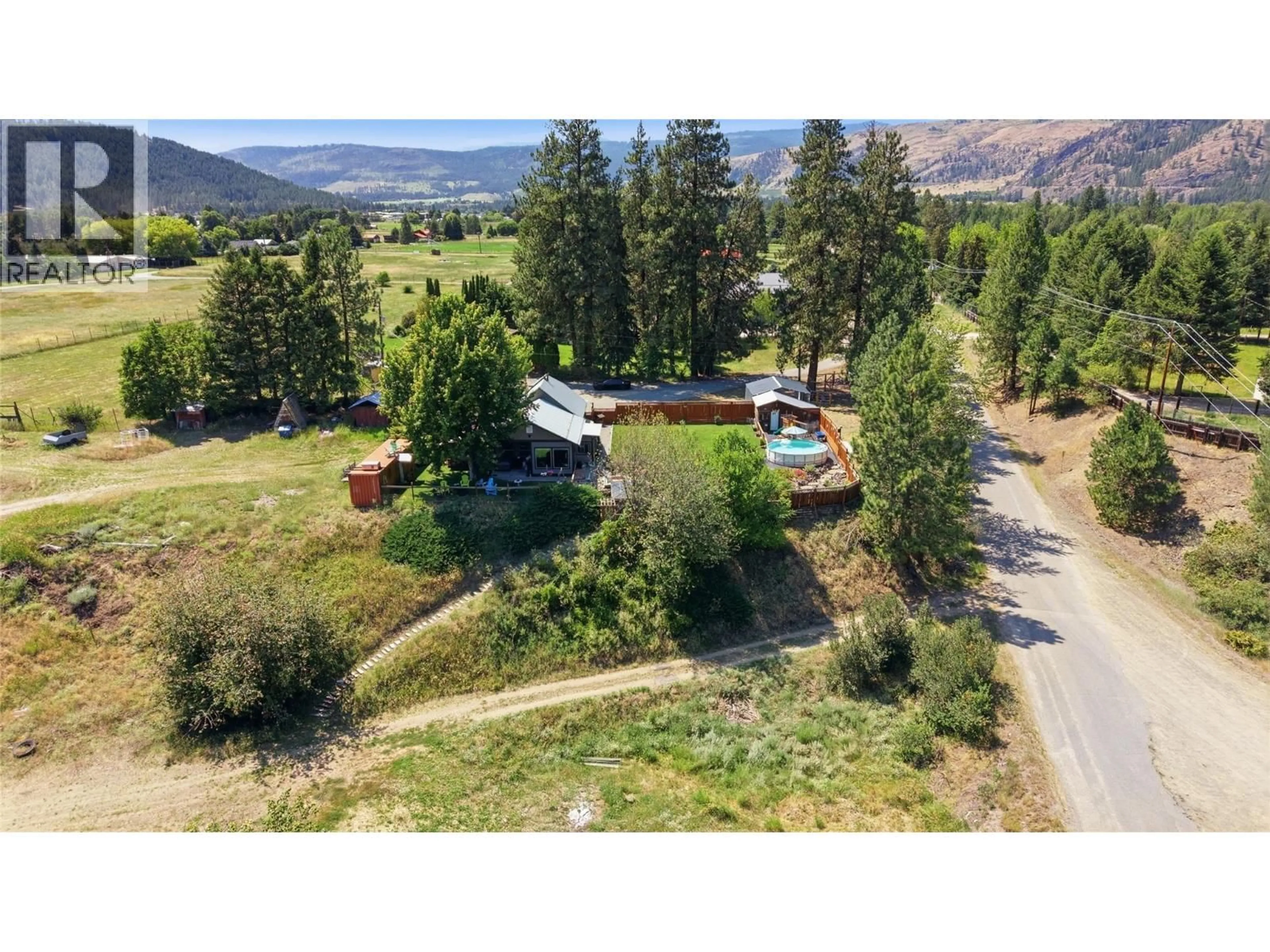 A pic from outside/outdoor area/front of a property/back of a property/a pic from drone, mountain view for 2200 ALMOND GARDENS ROAD, Grand Forks British Columbia V0H1H4