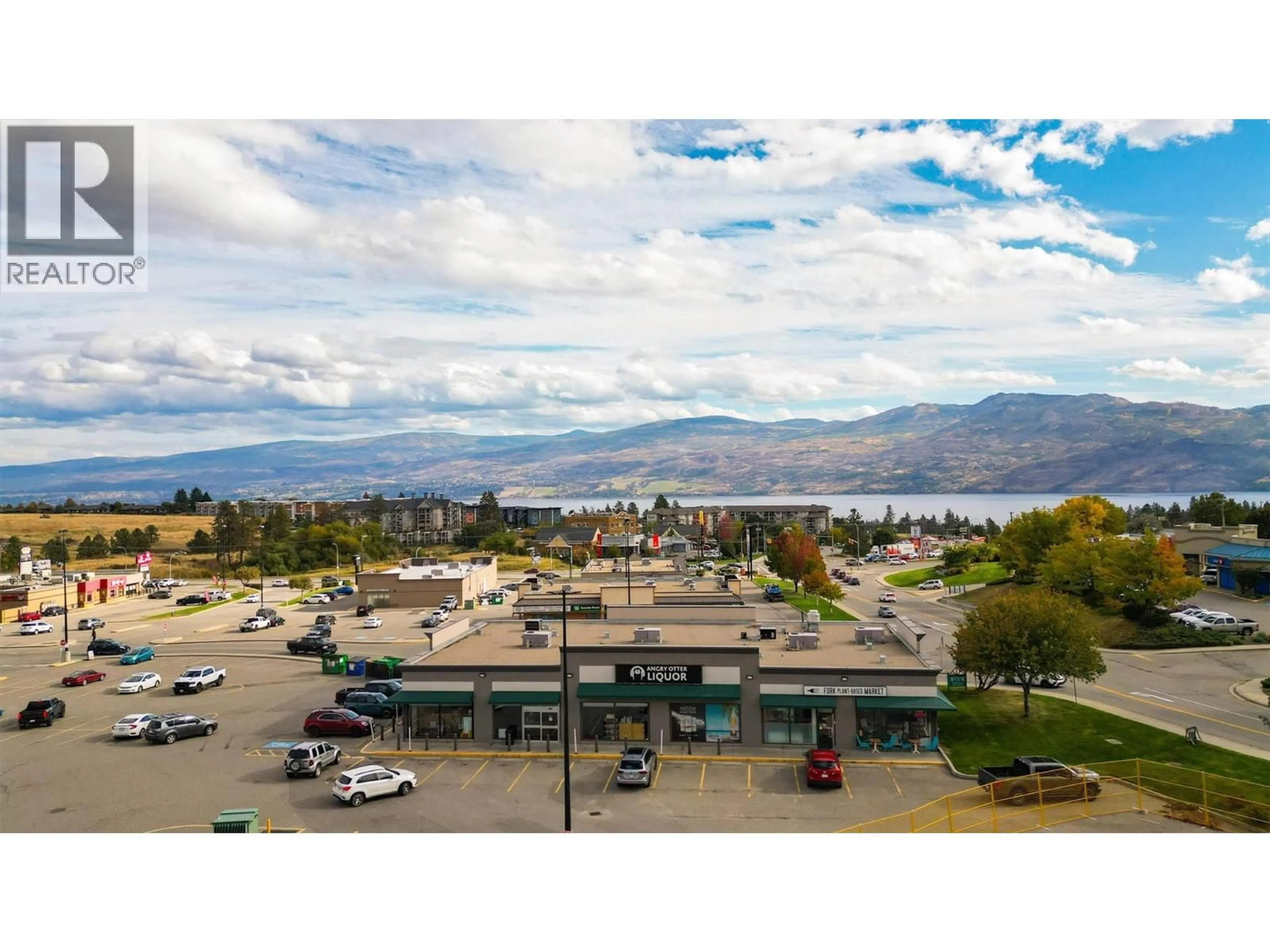 A pic from outside/outdoor area/front of a property/back of a property/a pic from drone, mountain view for 401 - 3645 GOSSET ROAD, West Kelowna British Columbia V1Z4C9