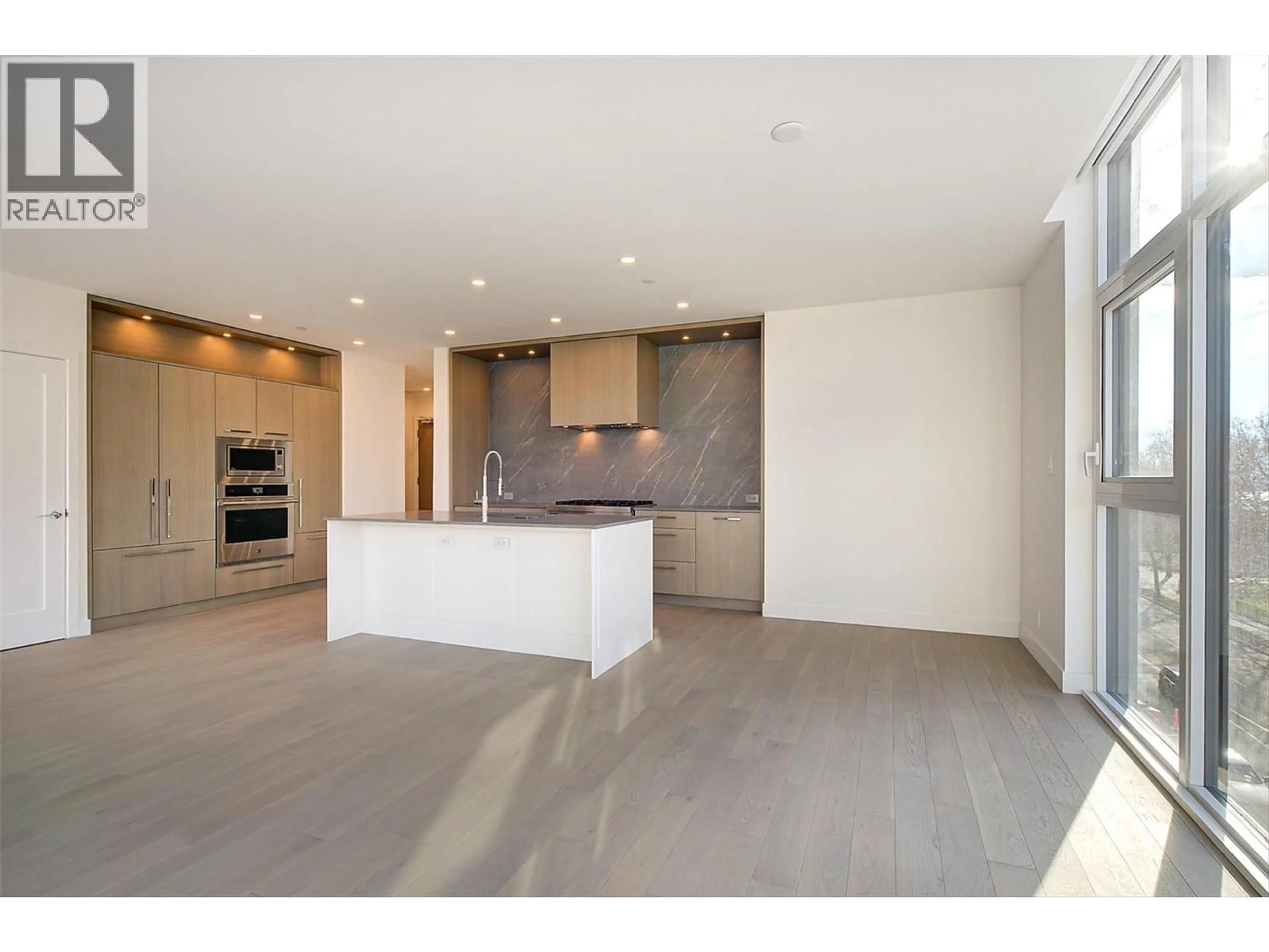 Open concept kitchen, unknown for 416 - 3389 LAKESHORE ROAD, Kelowna British Columbia V1W0G5