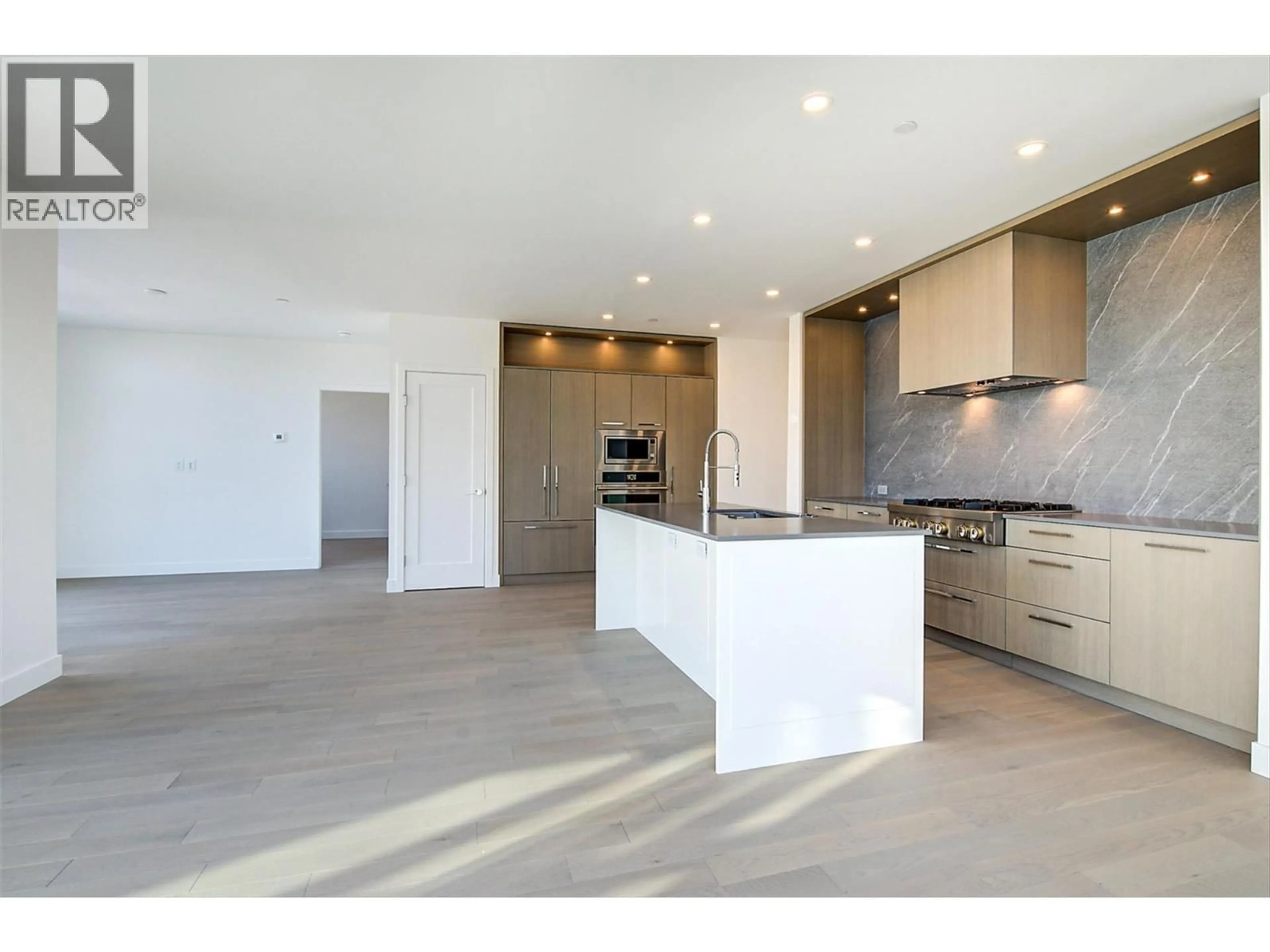 Open concept kitchen, unknown for 416 - 3389 LAKESHORE ROAD, Kelowna British Columbia V1W0G5