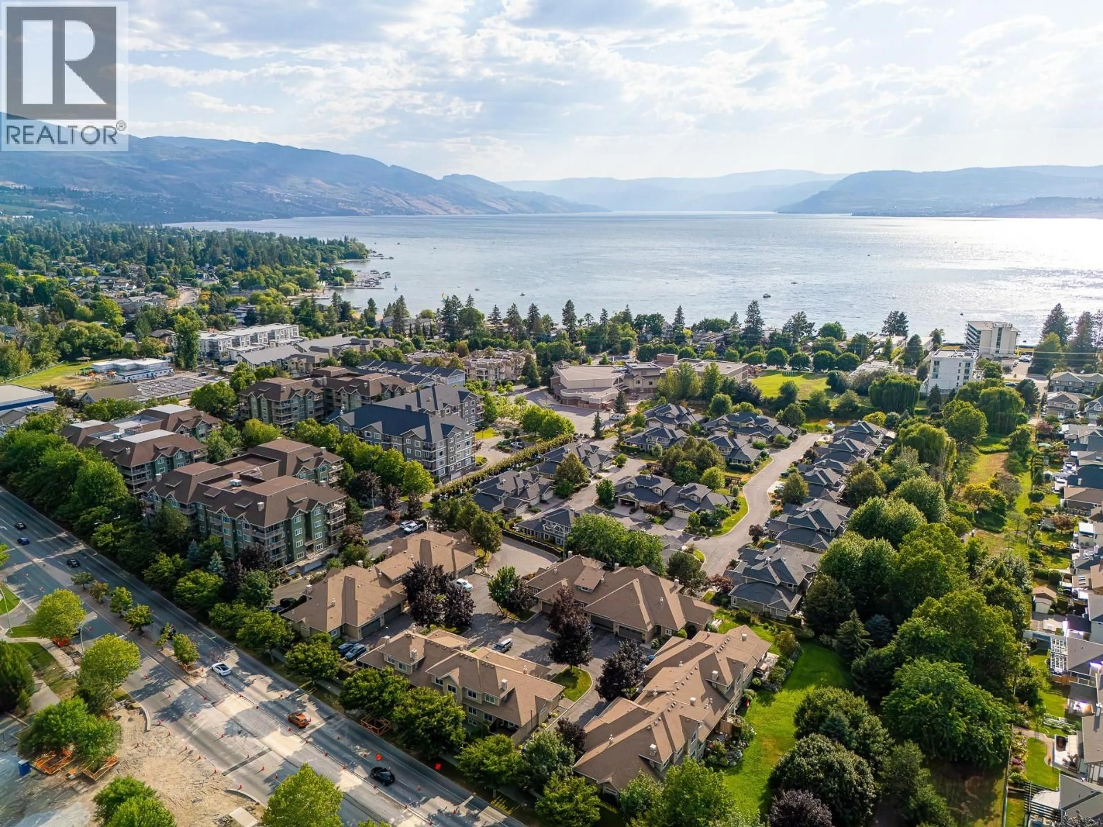 A pic from outside/outdoor area/front of a property/back of a property/a pic from drone, mountain view for 106 - 690 LEQUIME ROAD, Kelowna British Columbia V1W5B8