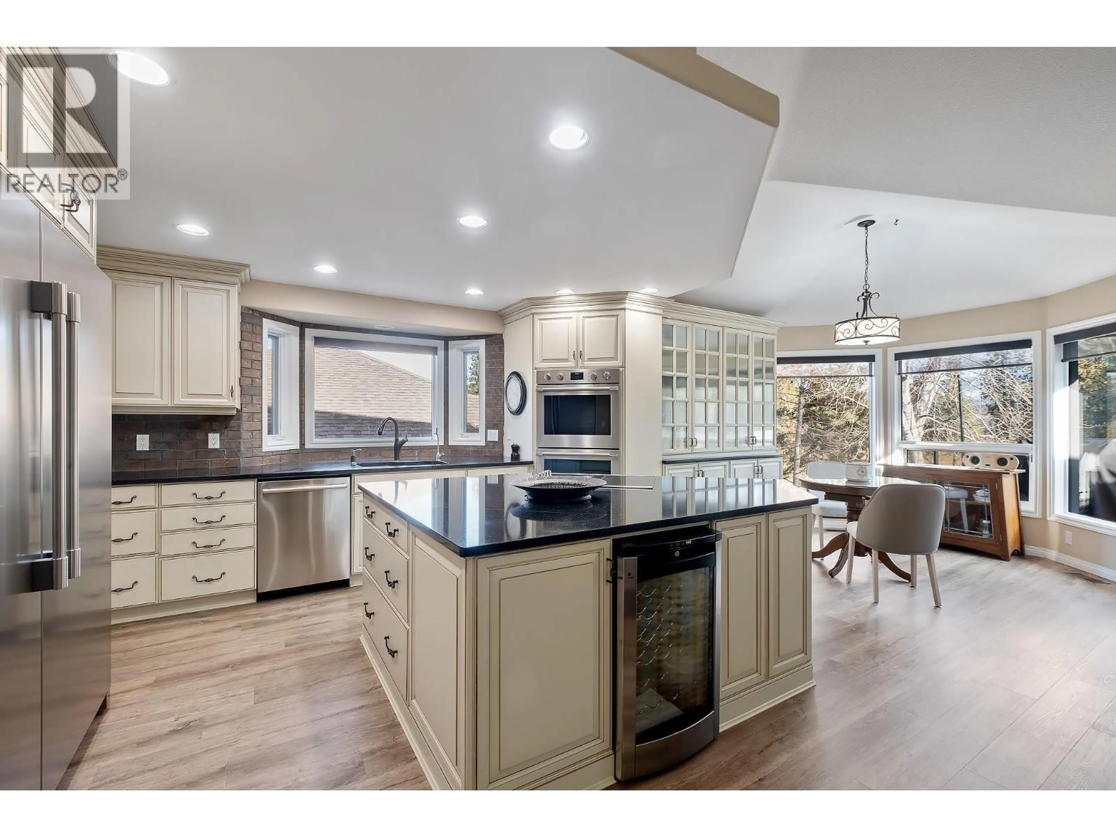 Open concept kitchen, ceramic/tile floor for 3907 GALLAGHERS CIRCLE, Kelowna British Columbia V1W3Z9