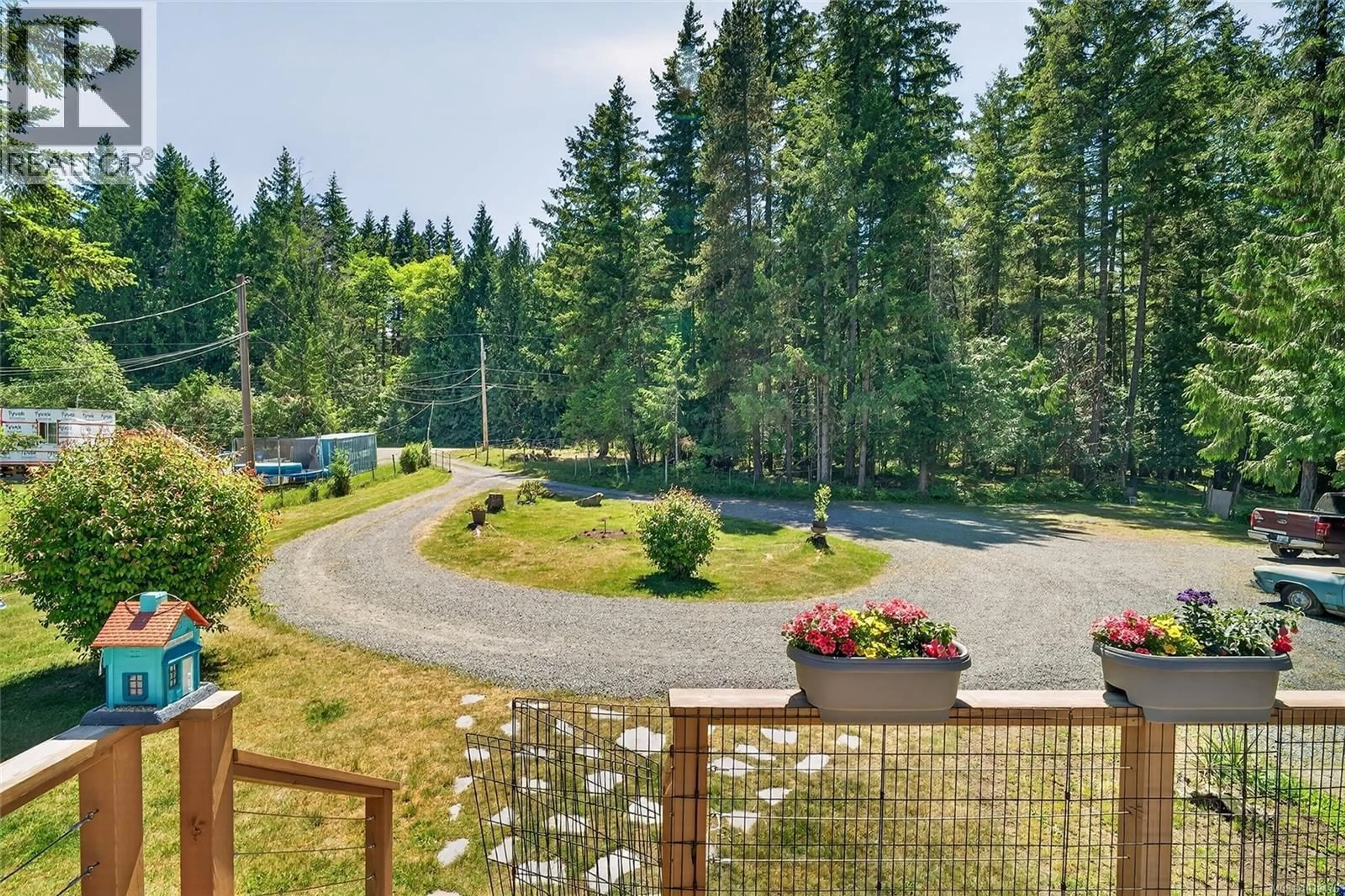 A pic from outside/outdoor area/front of a property/back of a property/a pic from drone, forest/trees view for 2411 TINTERN ROAD, Coombs British Columbia V0R1M0