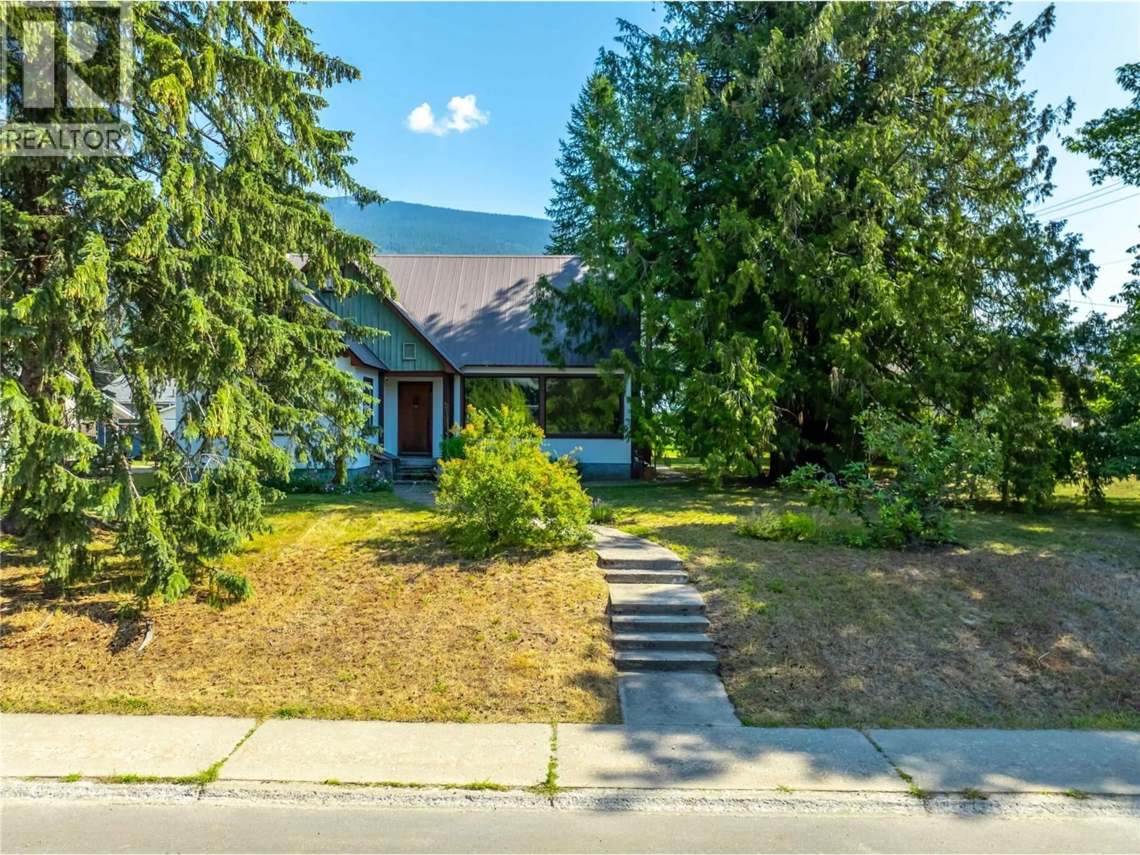 A pic from outside/outdoor area/front of a property/back of a property/a pic from drone, street for 422 NINTH STREET EAST, Revelstoke British Columbia V0E2S0