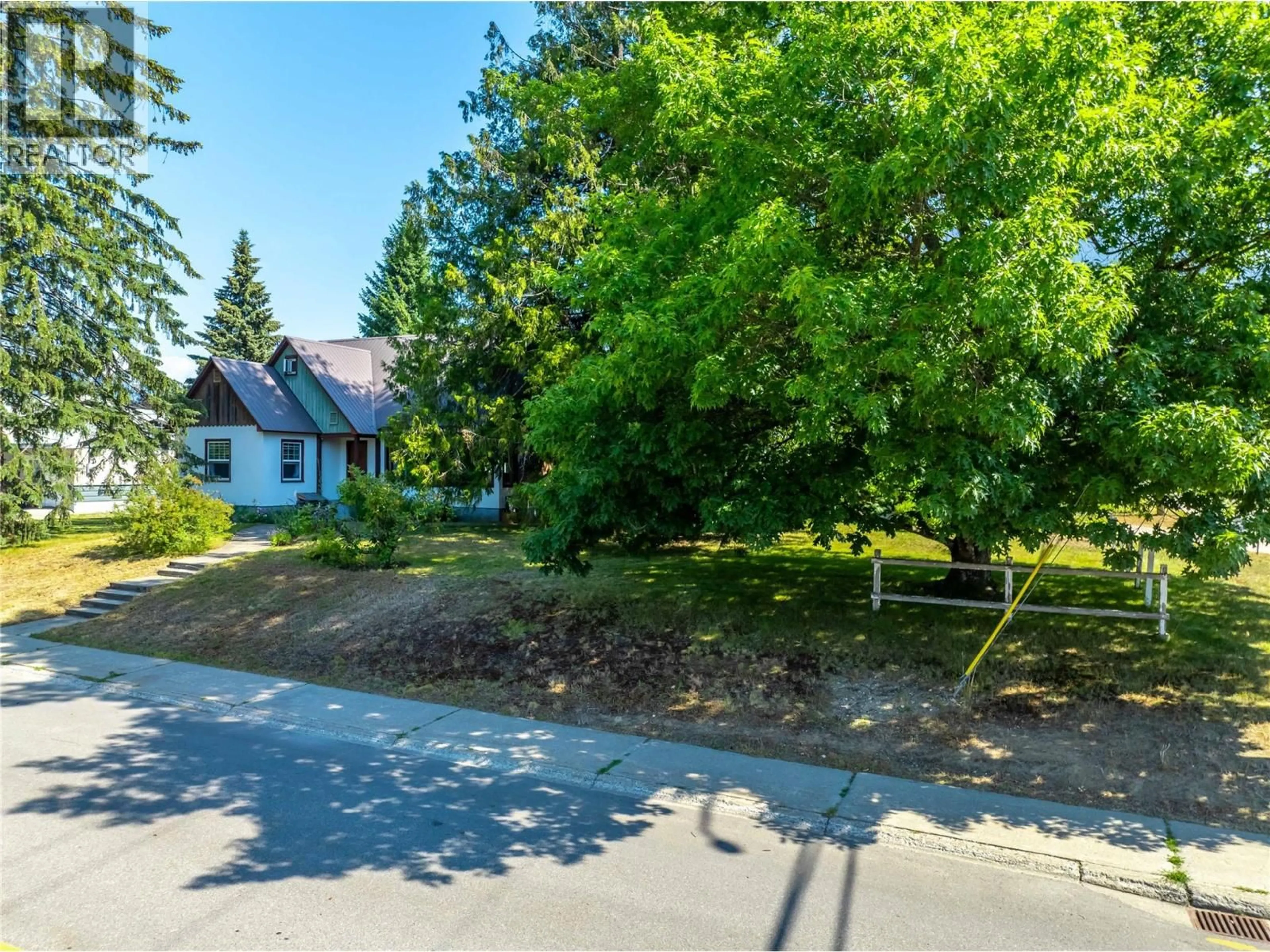 A pic from outside/outdoor area/front of a property/back of a property/a pic from drone, street for 422 NINTH STREET EAST, Revelstoke British Columbia V0E2S0