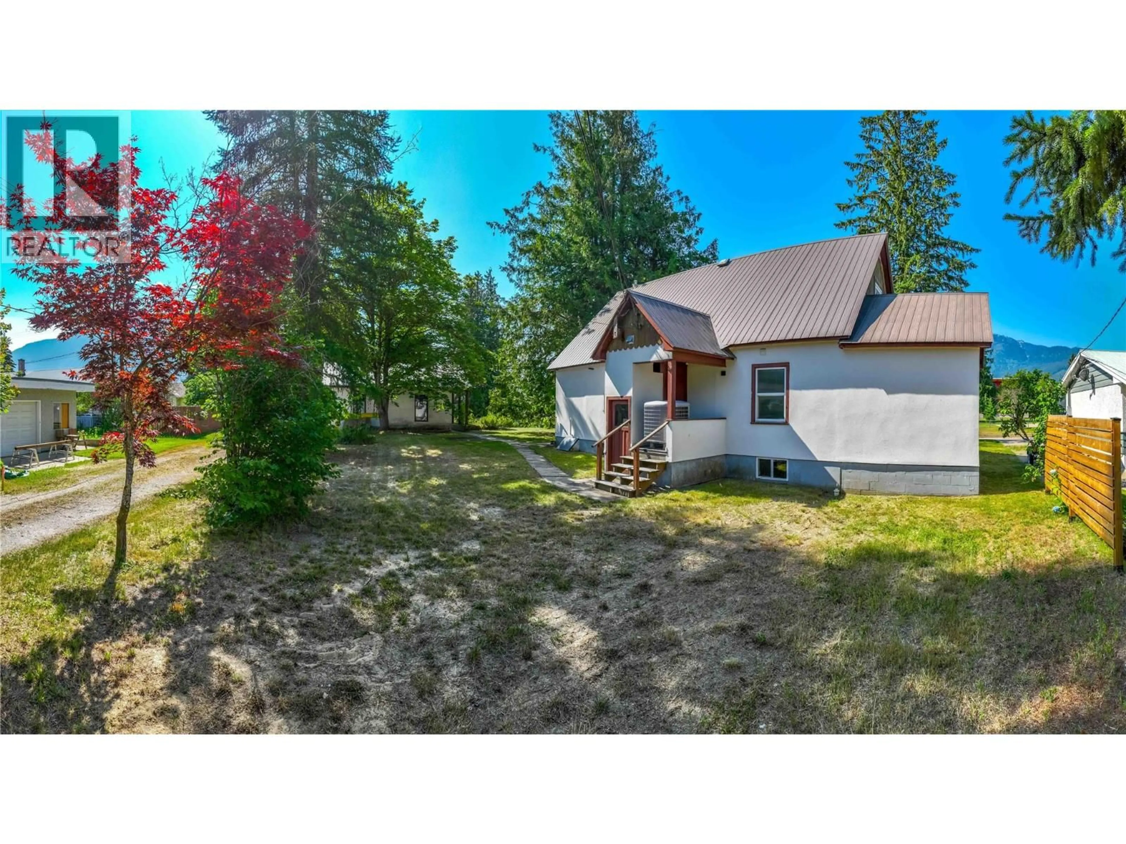 A pic from outside/outdoor area/front of a property/back of a property/a pic from drone, unknown for 422 NINTH STREET EAST, Revelstoke British Columbia V0E2S0
