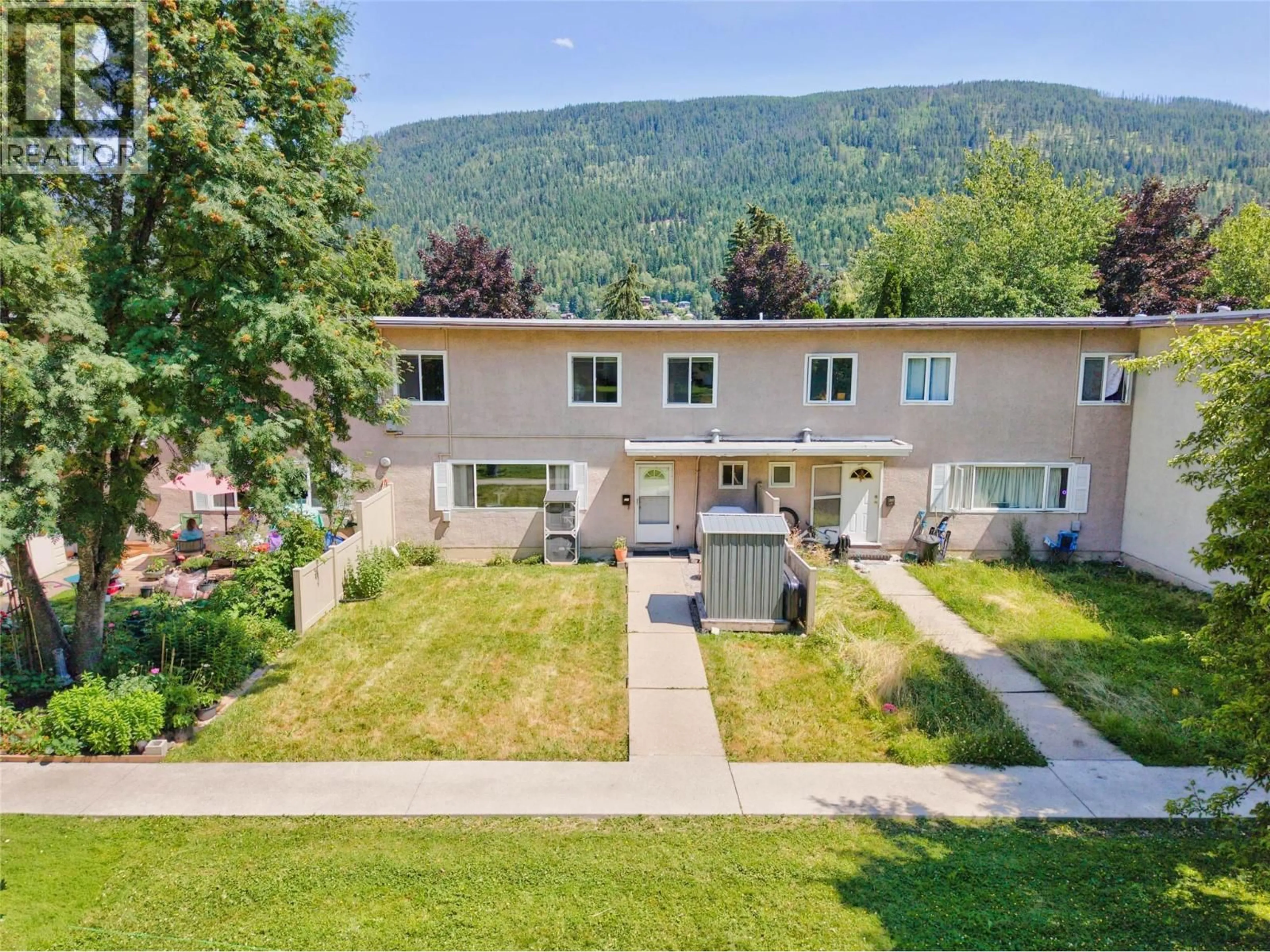 A pic from outside/outdoor area/front of a property/back of a property/a pic from drone, mountain view for 429 RICHARDS    W STREET, Nelson British Columbia V1L3K2