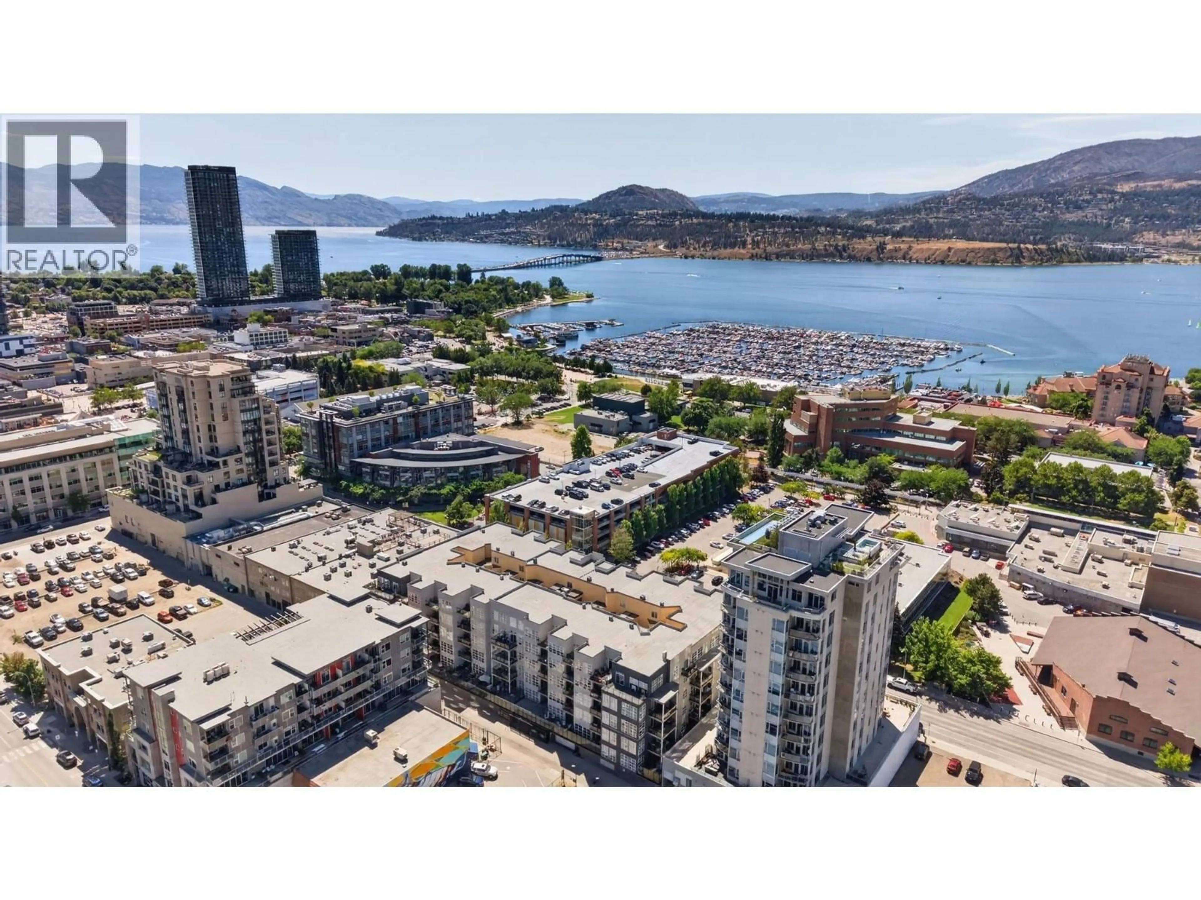A pic from outside/outdoor area/front of a property/back of a property/a pic from drone, water/lake/river/ocean view for 320 - 1331 ELLIS STREET, Kelowna British Columbia V1Y1Z9