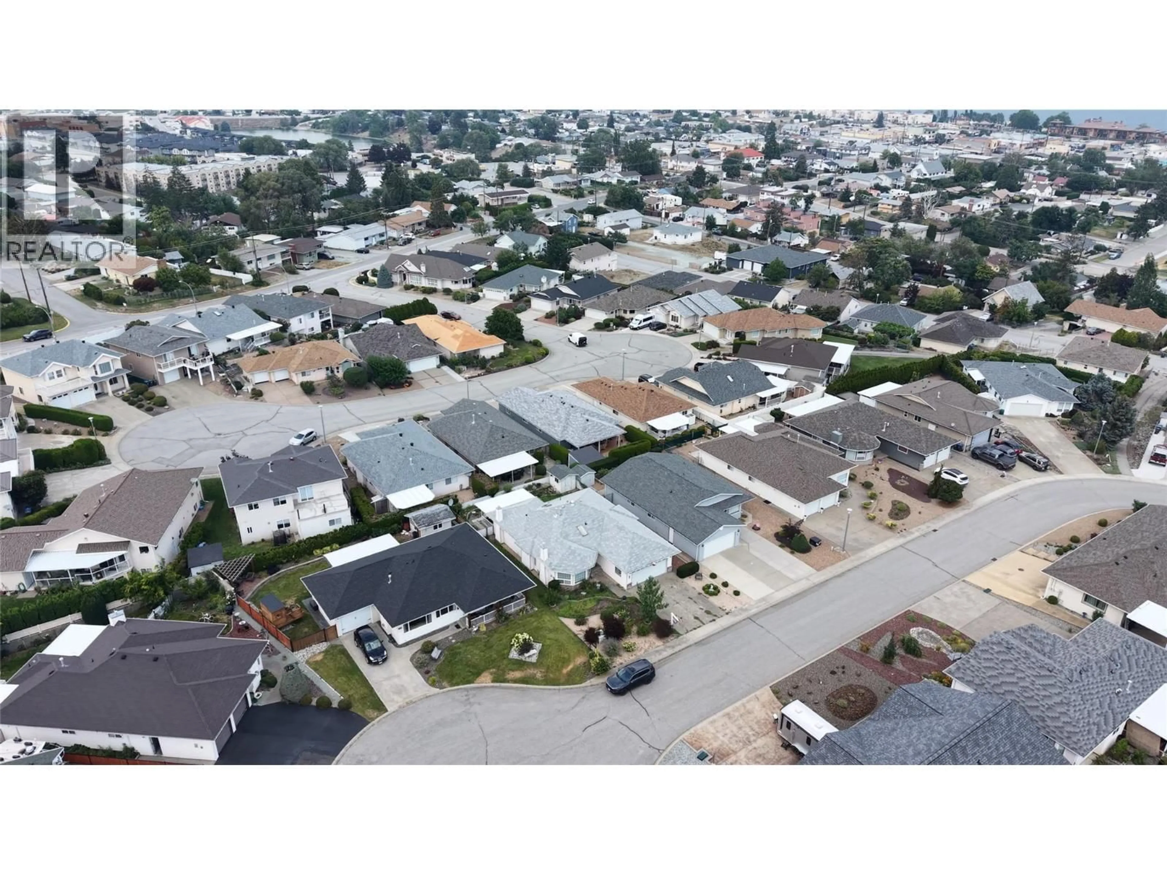 A pic from outside/outdoor area/front of a property/back of a property/a pic from drone, street for 29 KILLDEER PL. PLACE, Osoyoos British Columbia V0H1V2