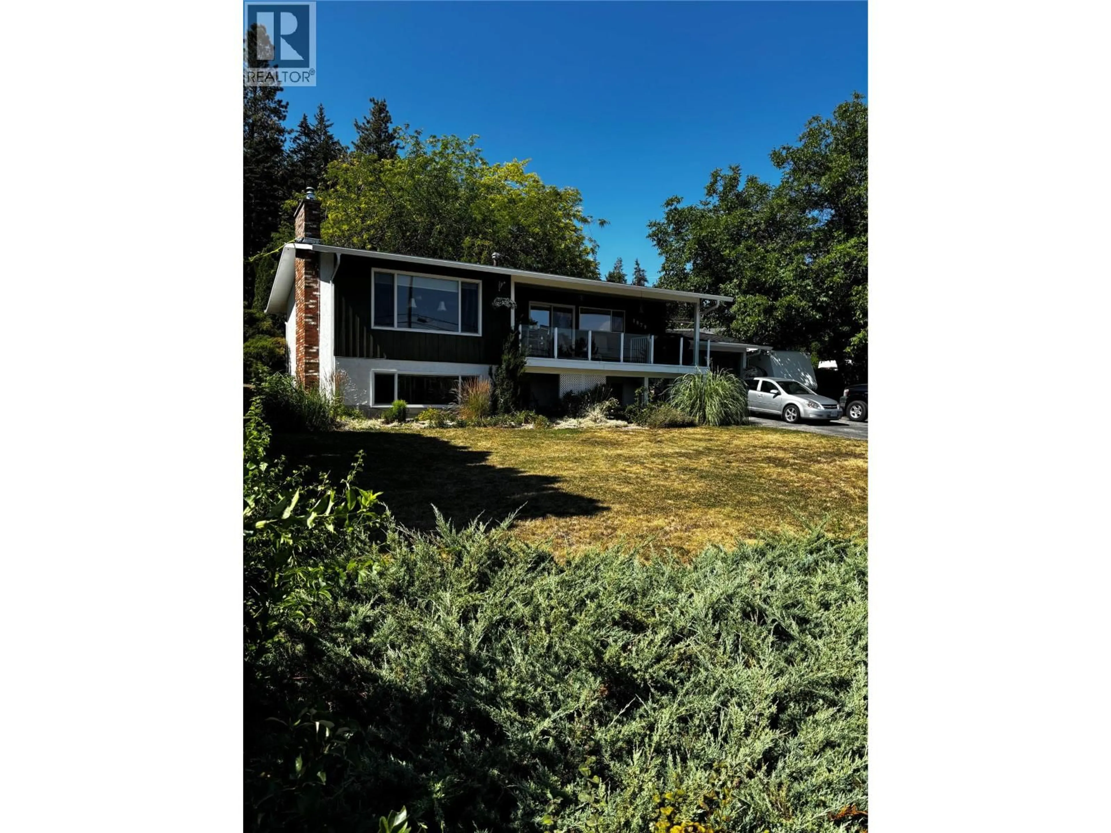 A pic from outside/outdoor area/front of a property/back of a property/a pic from drone, street for 3079 OURTOLAND ROAD, West Kelowna British Columbia V1Z2J3