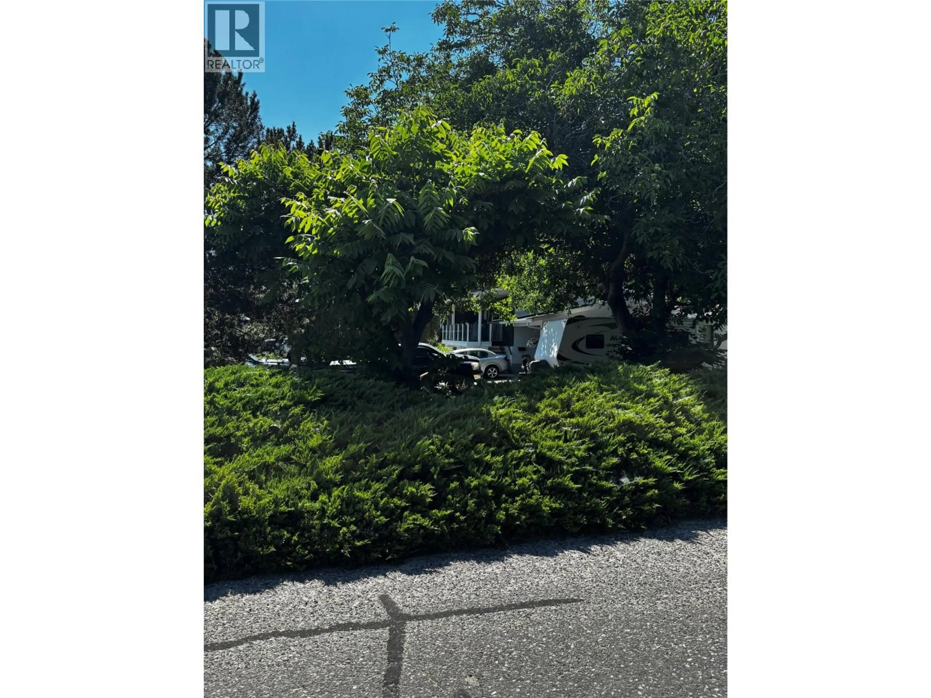 A pic from outside/outdoor area/front of a property/back of a property/a pic from drone, forest/trees view for 3079 OURTOLAND ROAD, West Kelowna British Columbia V1Z2J3