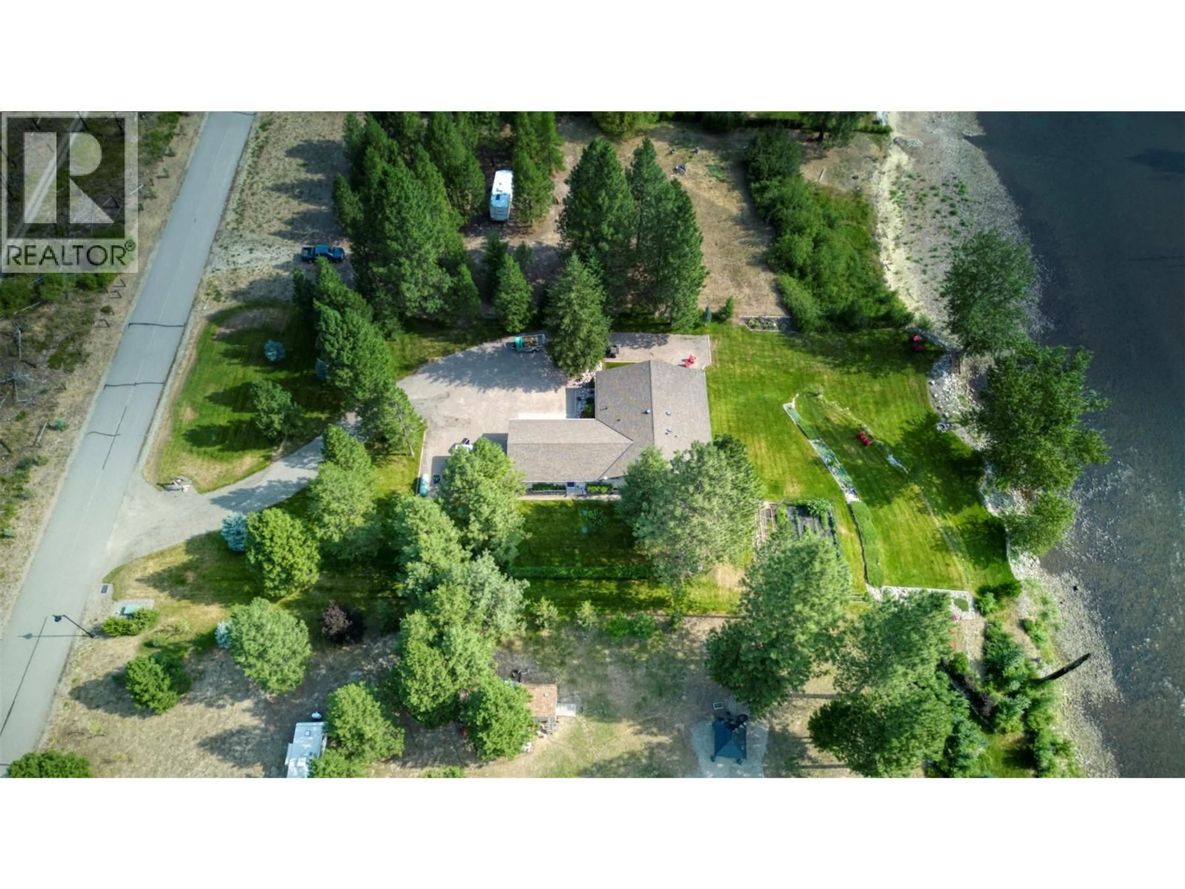 A pic from outside/outdoor area/front of a property/back of a property/a pic from drone, unknown for 212 VINTAGE LANE, Rock Creek British Columbia V0H1Y0