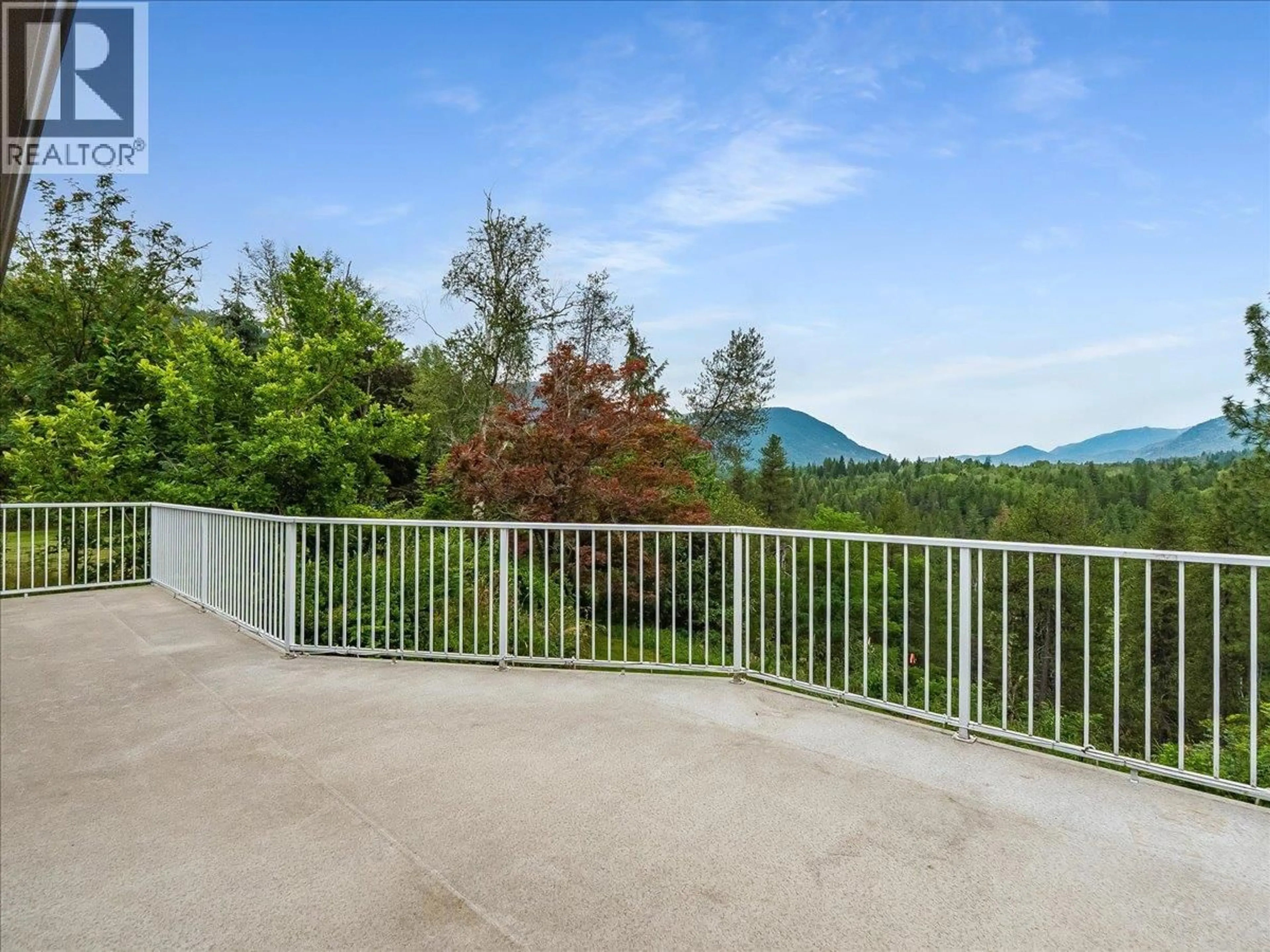 Patio, mountain view for 138 100TH STREET, Castlegar British Columbia V1N3C8