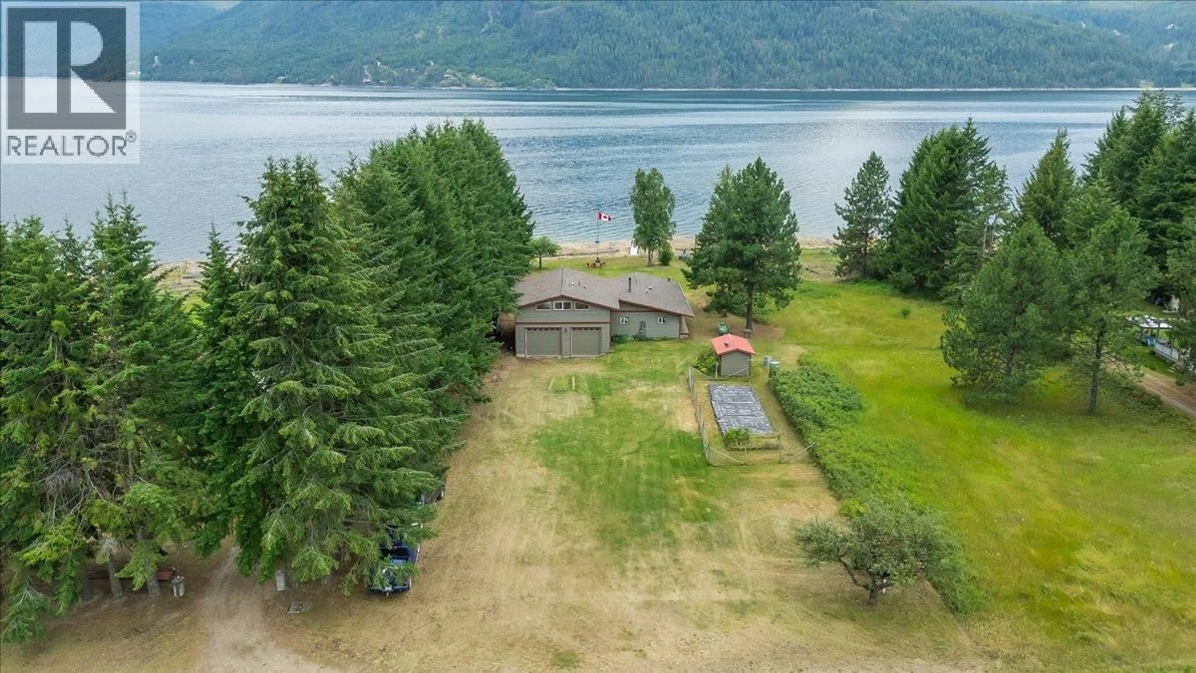 A pic from outside/outdoor area/front of a property/back of a property/a pic from drone, water/lake/river/ocean view for 7510 DEER PARK ROAD, Castlegar British Columbia V1N4V8