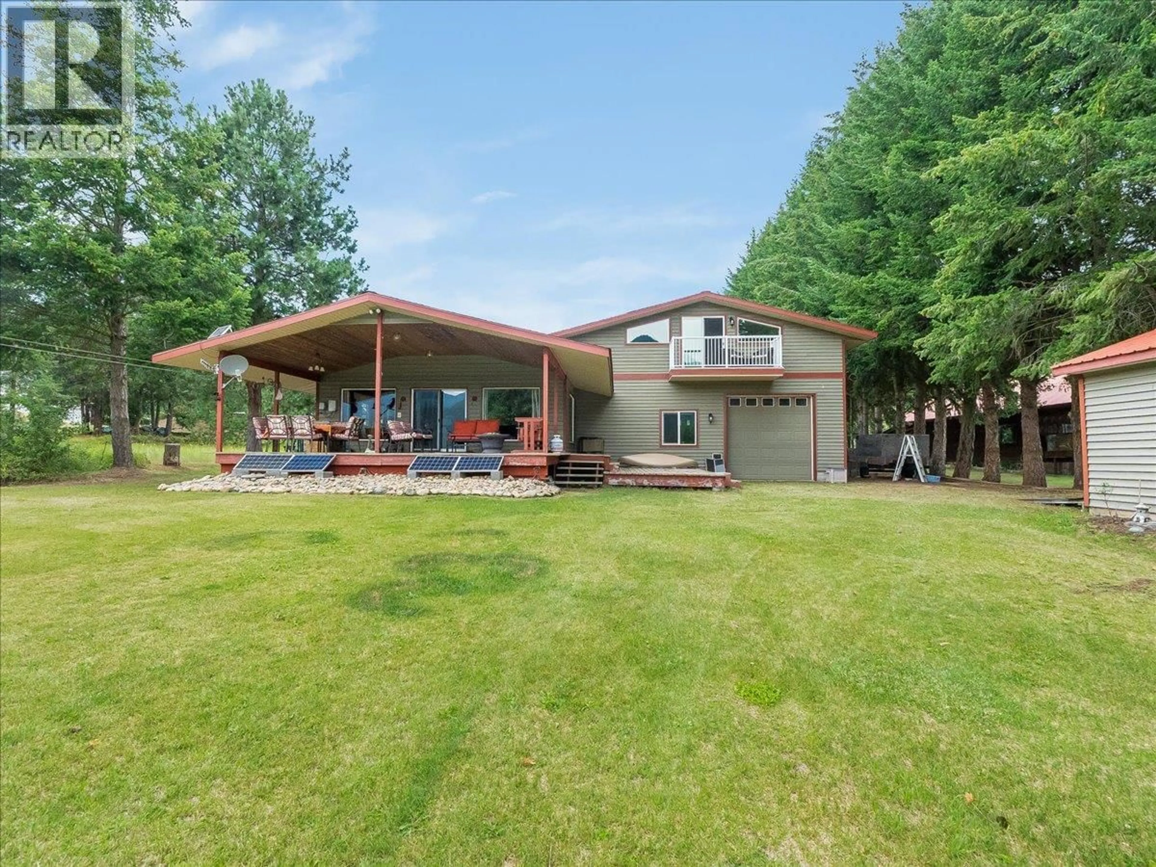 A pic from outside/outdoor area/front of a property/back of a property/a pic from drone, water/lake/river/ocean view for 7510 DEER PARK ROAD, Castlegar British Columbia V1N4V8