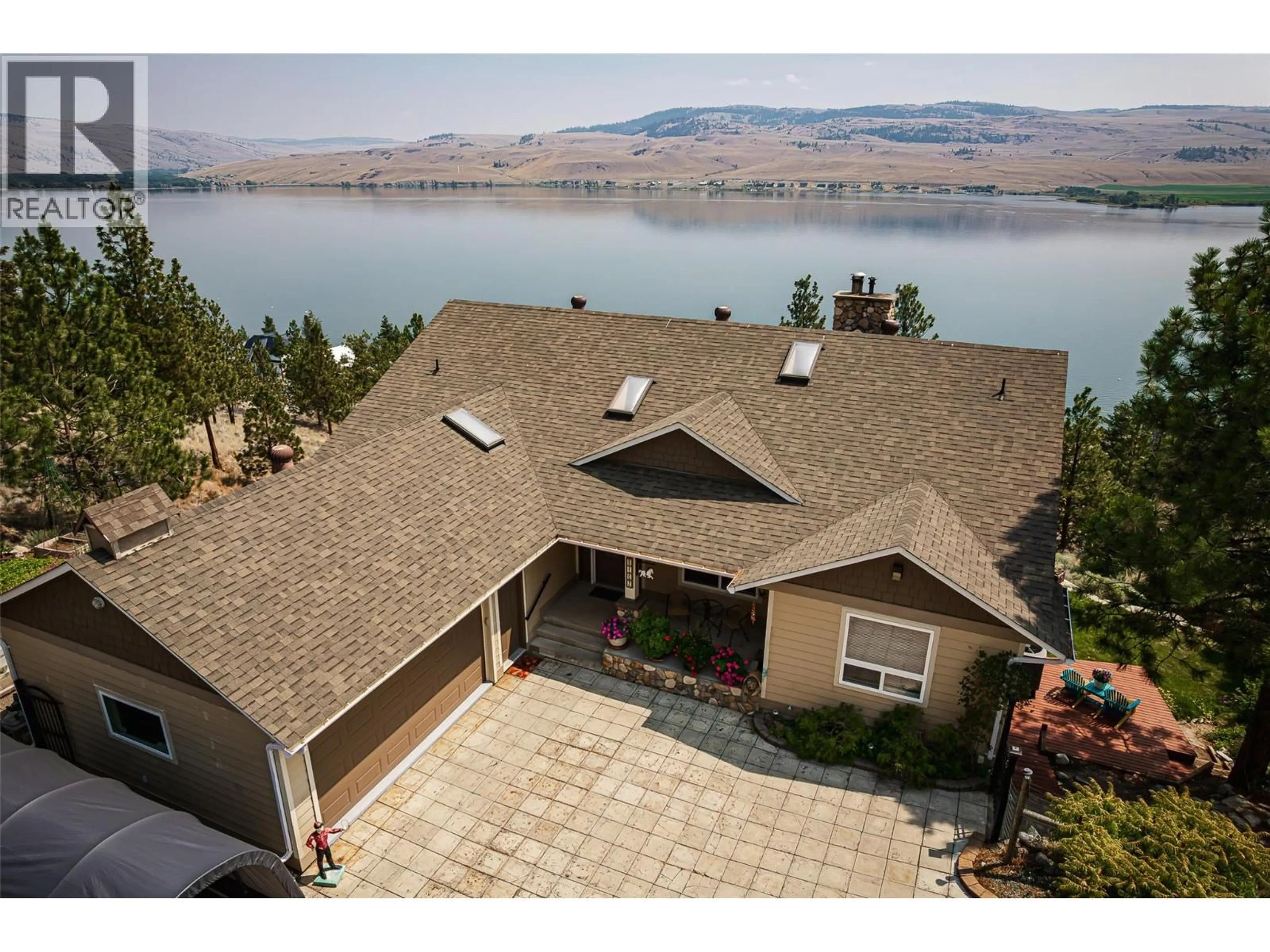 Home with vinyl exterior material, water/lake/river/ocean view for 6407 MONCK PARK ROAD, Merritt British Columbia V1K0A1