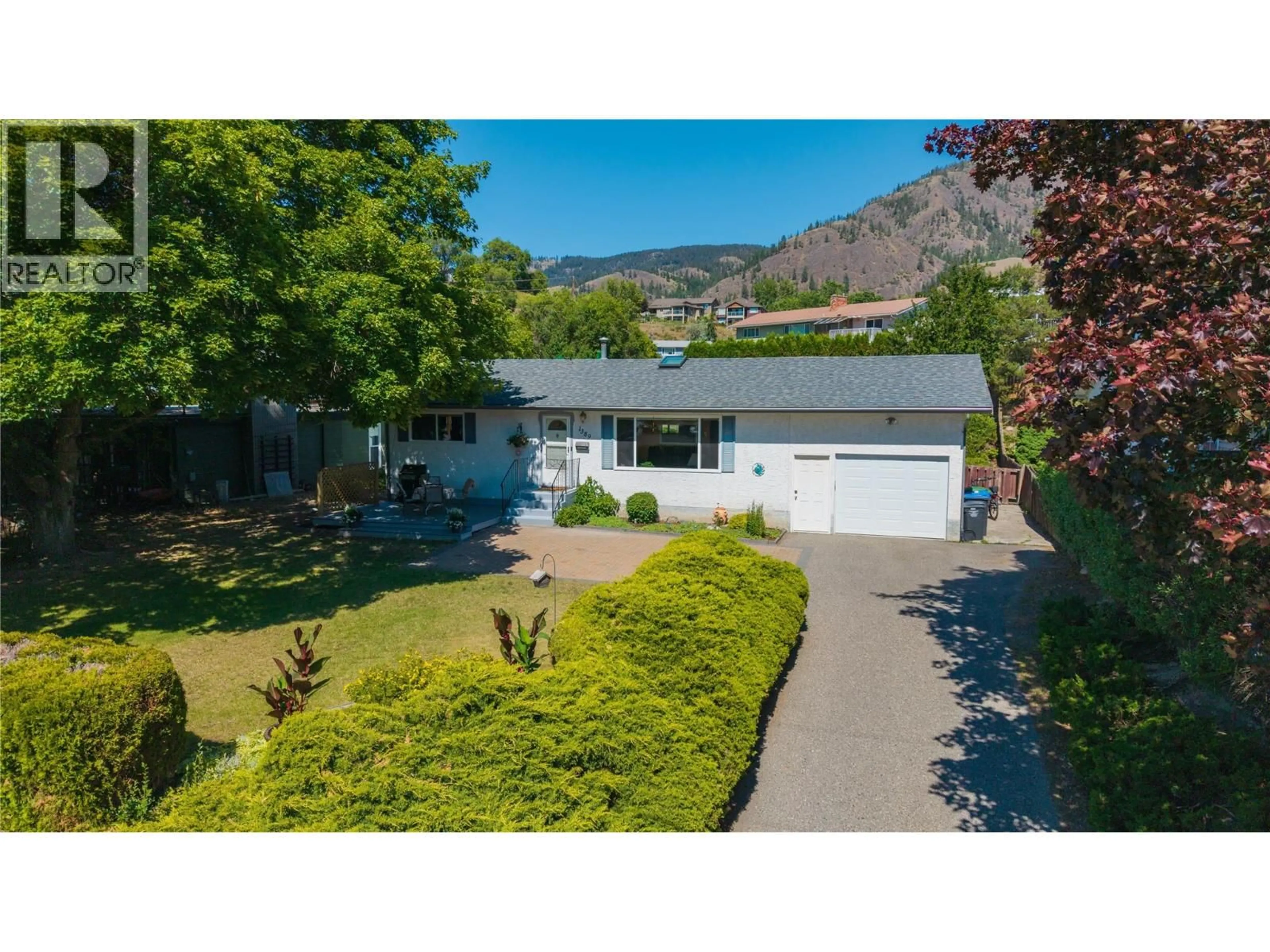 A pic from outside/outdoor area/front of a property/back of a property/a pic from drone, mountain view for 1389 LUND ROAD, Kelowna British Columbia V2B1K9