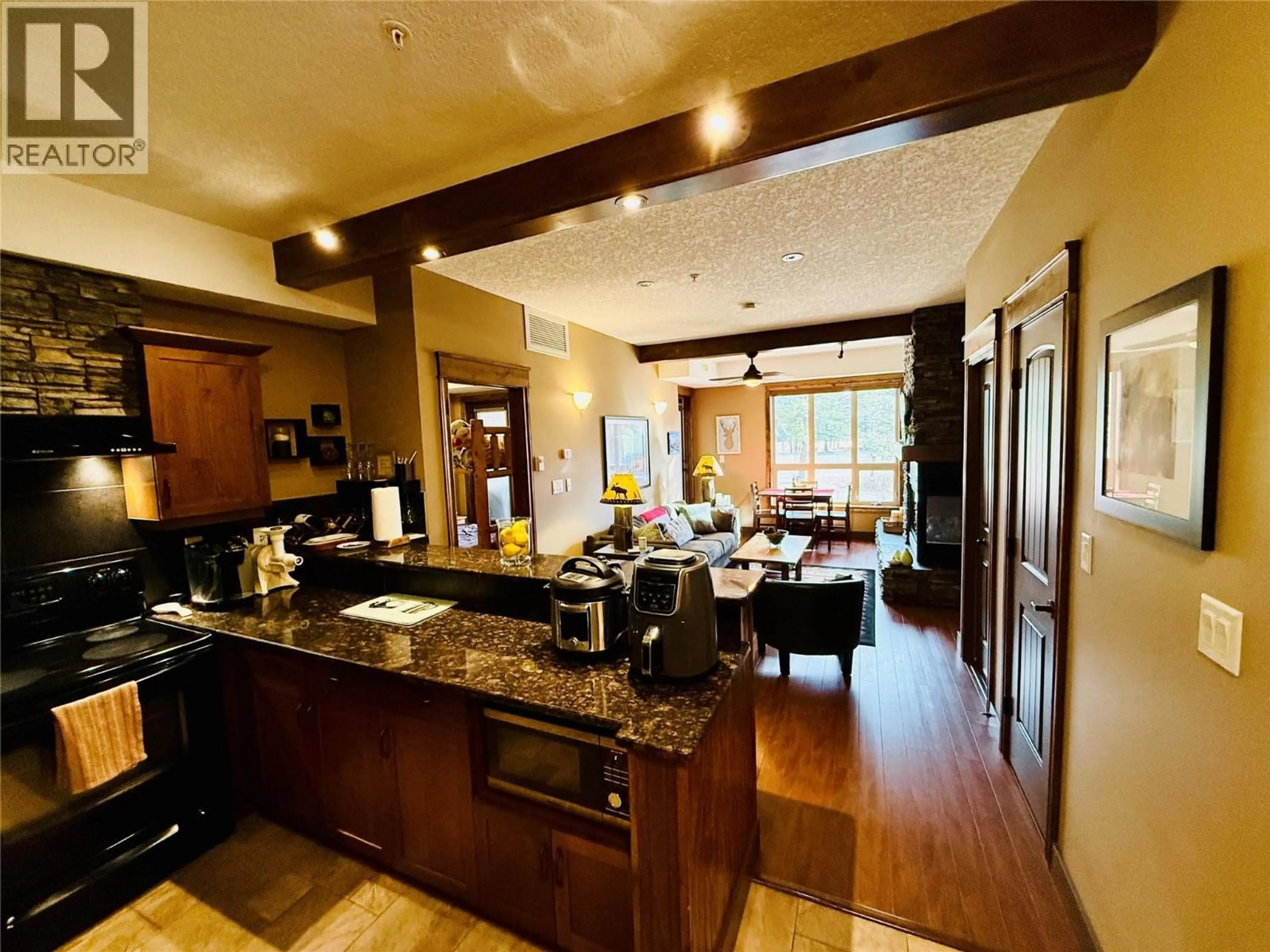 Open concept kitchen, unknown for 2103 - 7495 COLUMBIA AVENUE, Radium Hot Springs British Columbia V0A1M0
