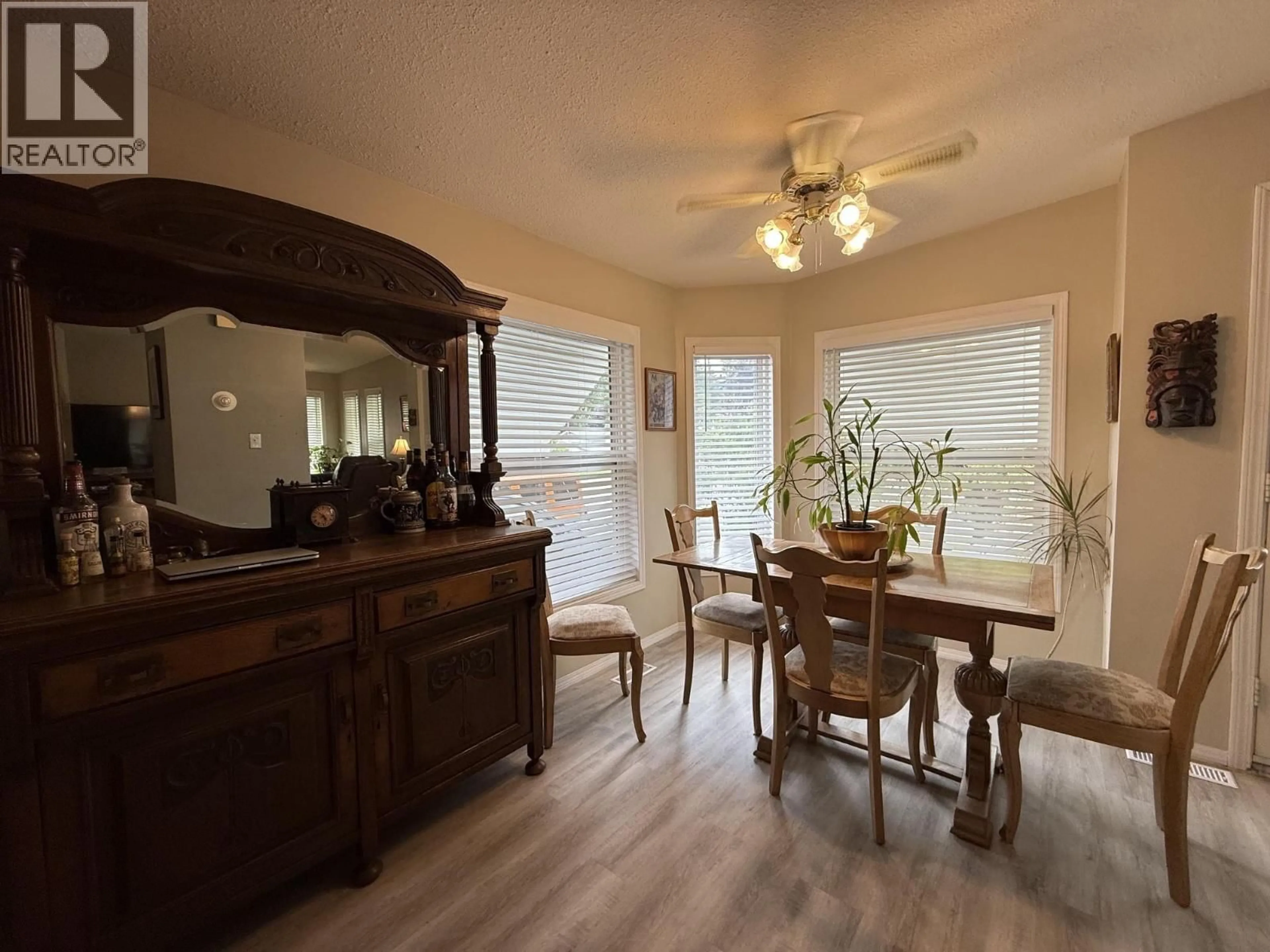 Dining room, wood/laminate floor for 451 MCLEAN ROAD, Barriere British Columbia V0E1E0