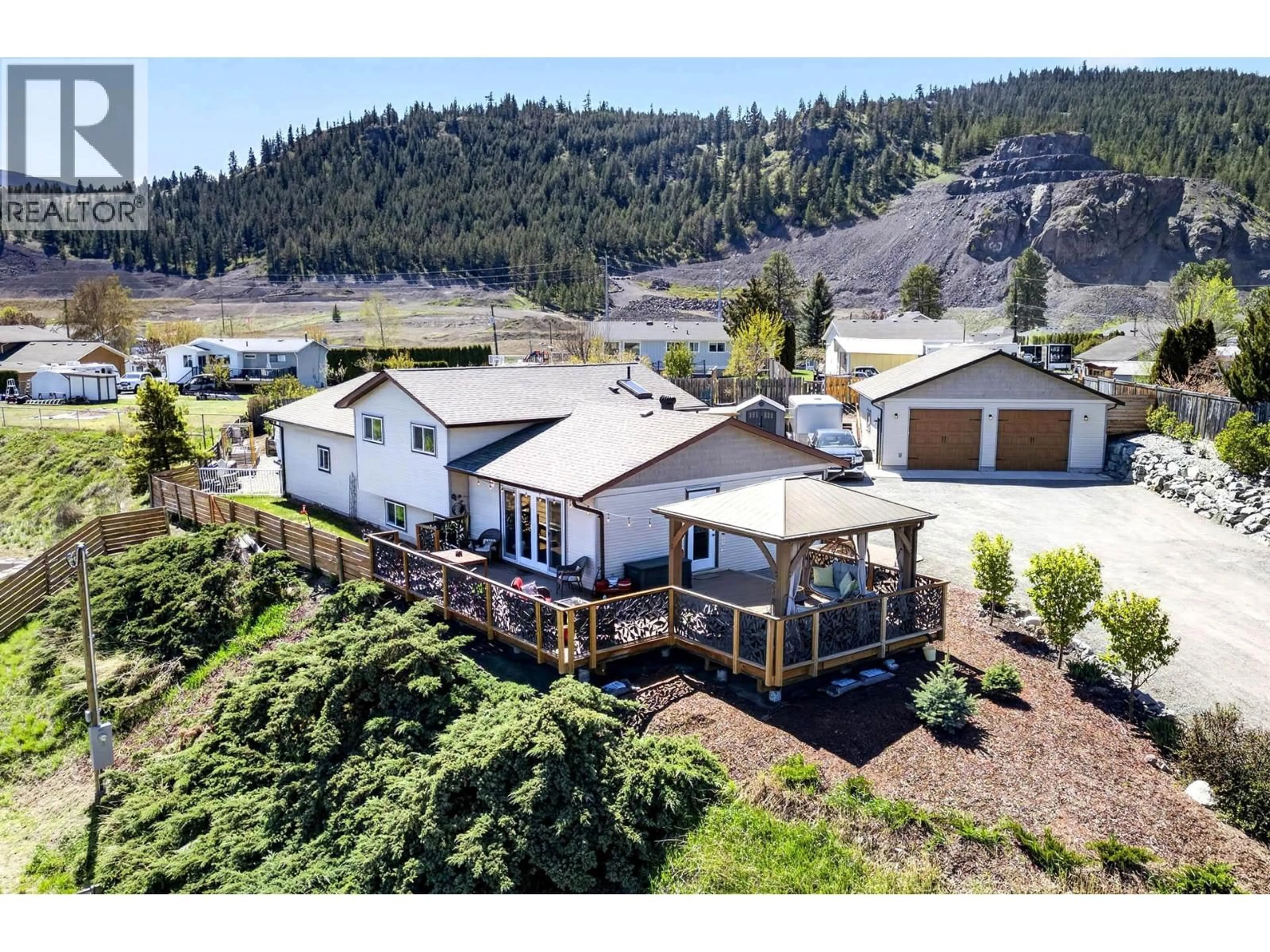 A pic from outside/outdoor area/front of a property/back of a property/a pic from drone, water/lake/river/ocean view for 1301 FIR AVENUE, Merritt British Columbia V1S1L1