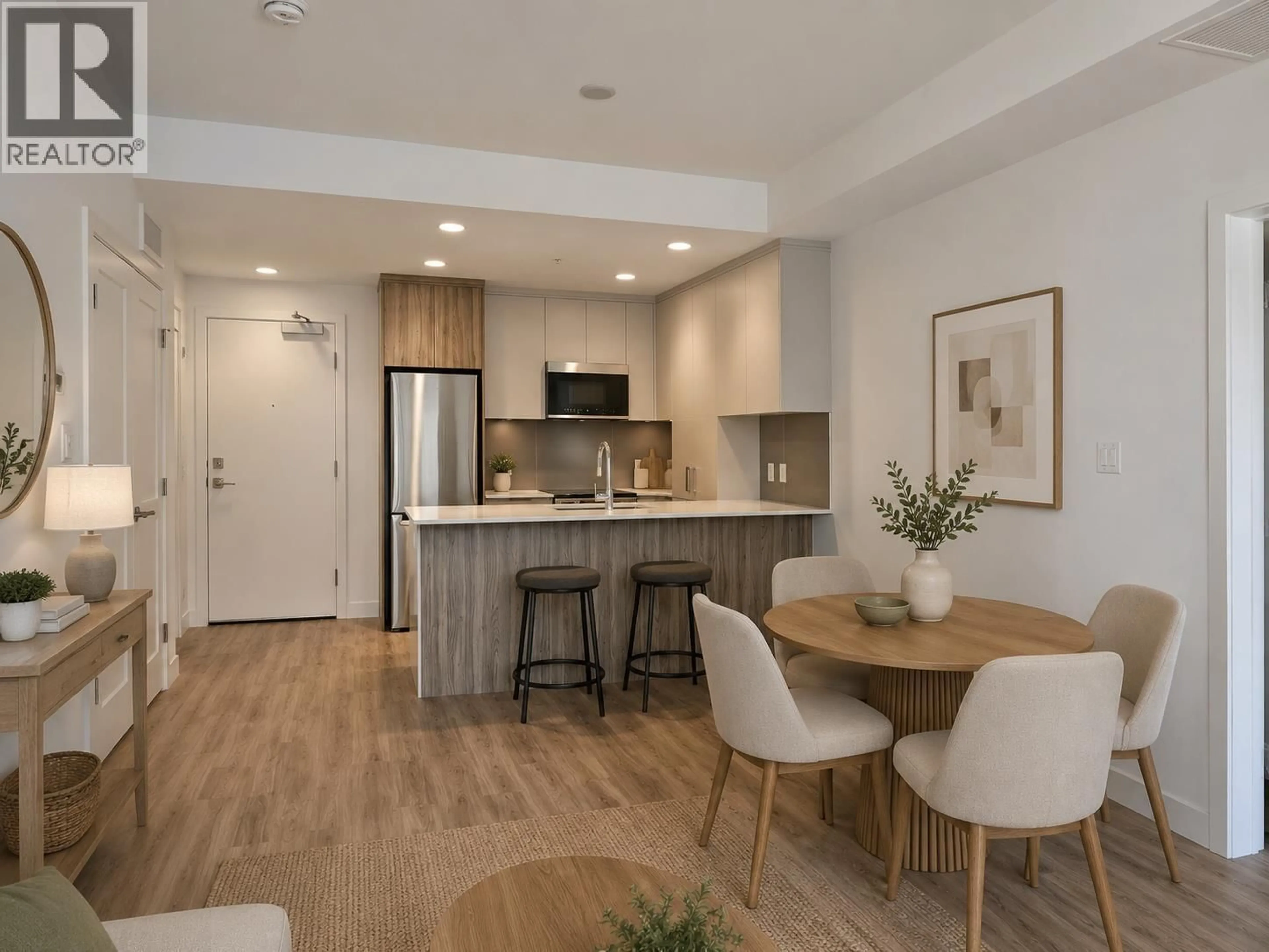 Open concept kitchen, wood/laminate floor for 420 - 271 WYLIE STREET, Penticton British Columbia V2A0L3