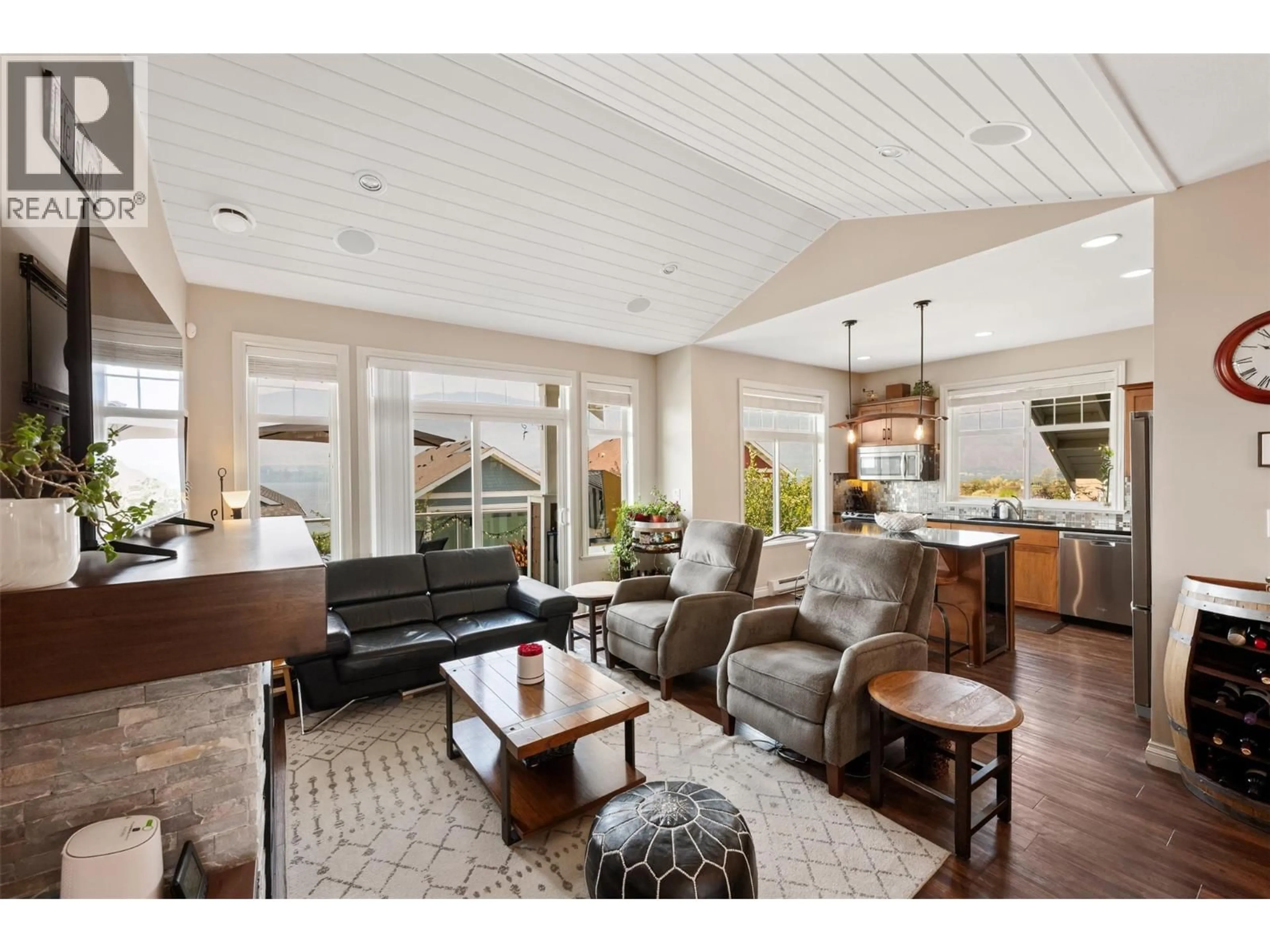 Living room with furniture, wood/laminate floor for 228 - 2450 RADIO TOWER ROAD, Oliver British Columbia V0H1T1