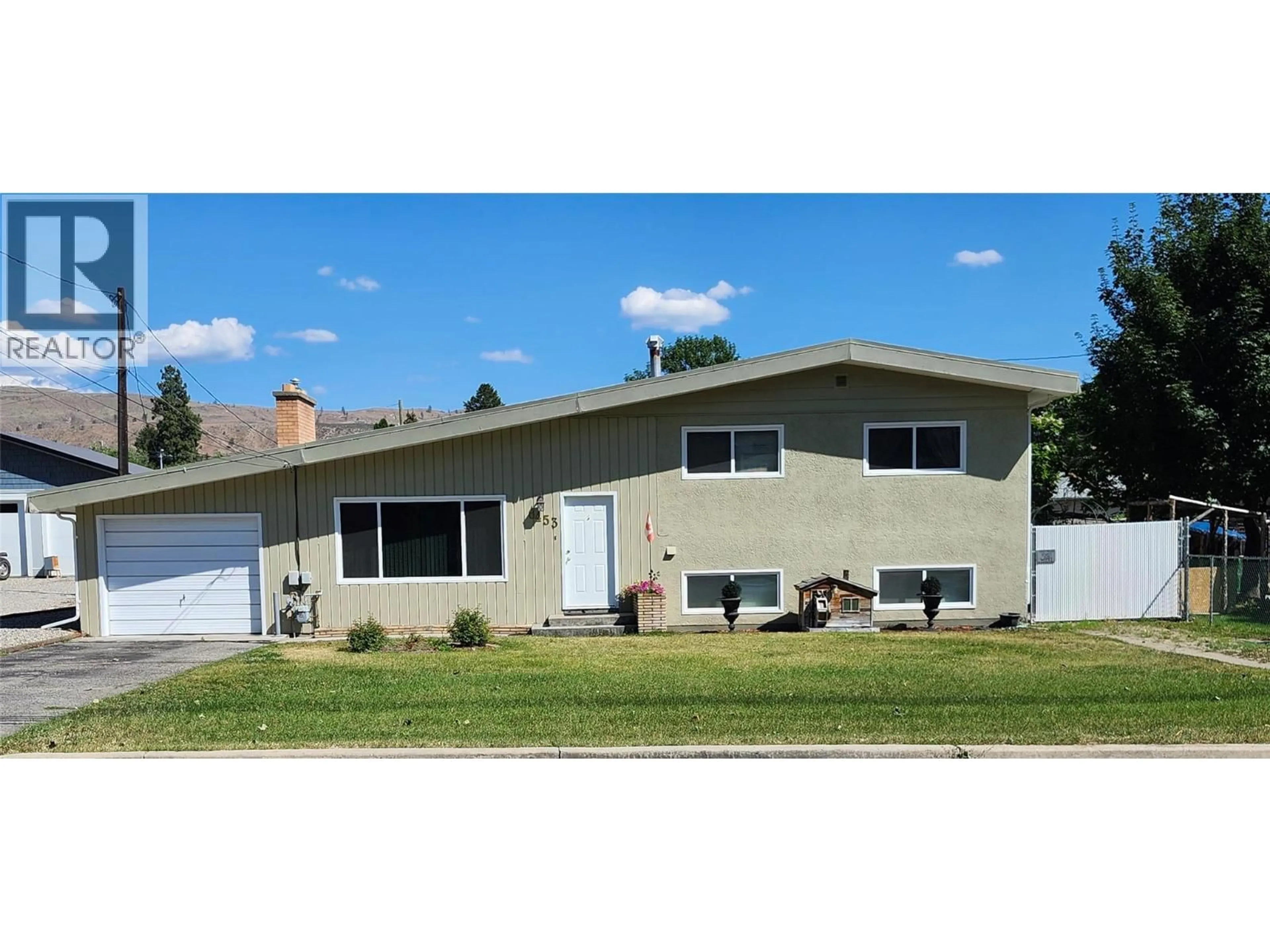 Home with vinyl exterior material, street for 6453 PARK DRIVE, Oliver British Columbia V0H1T3