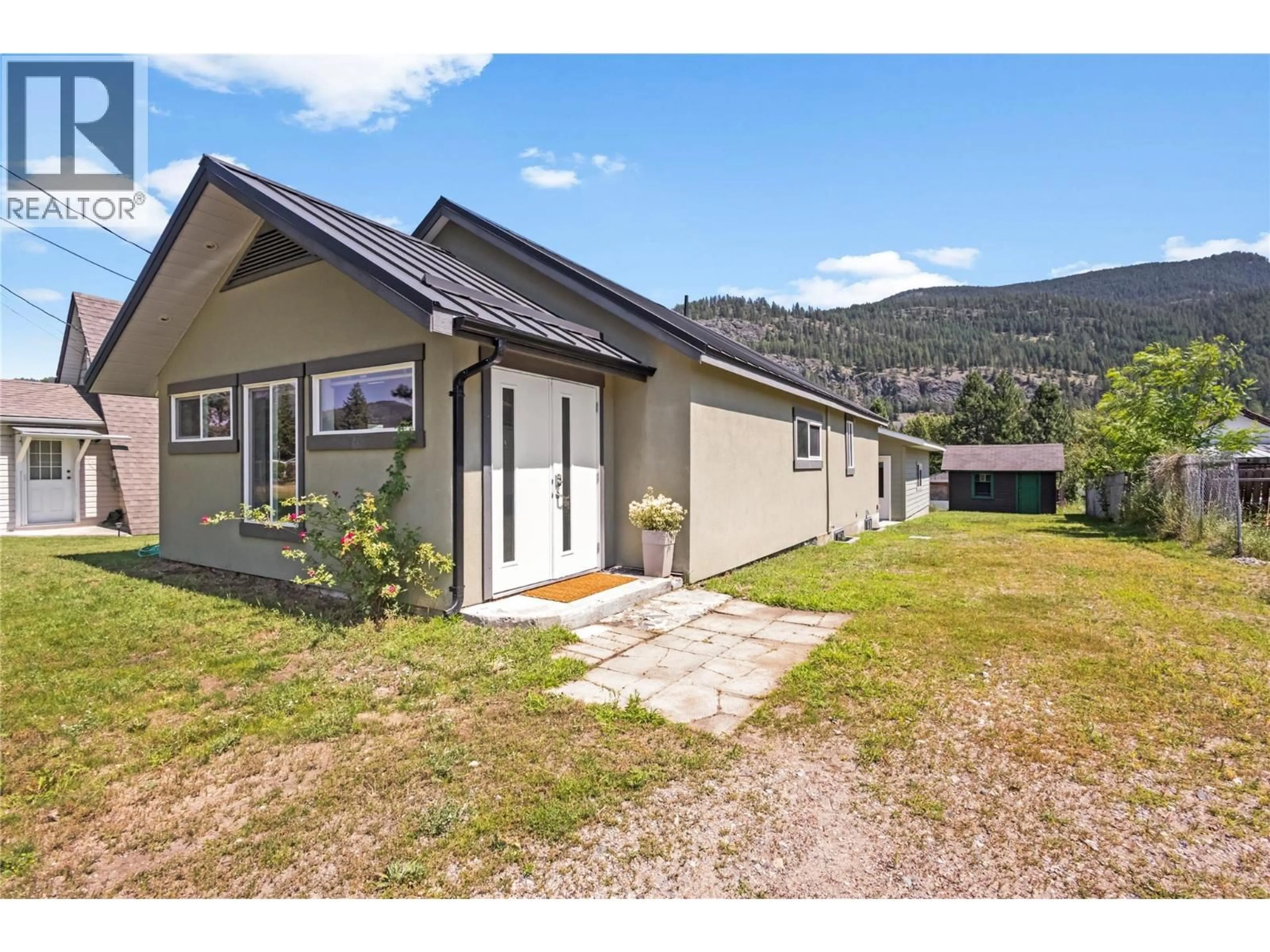 A pic from outside/outdoor area/front of a property/back of a property/a pic from drone, mountain view for 1640 ODE ROAD, Christina Lake British Columbia V0H1E0