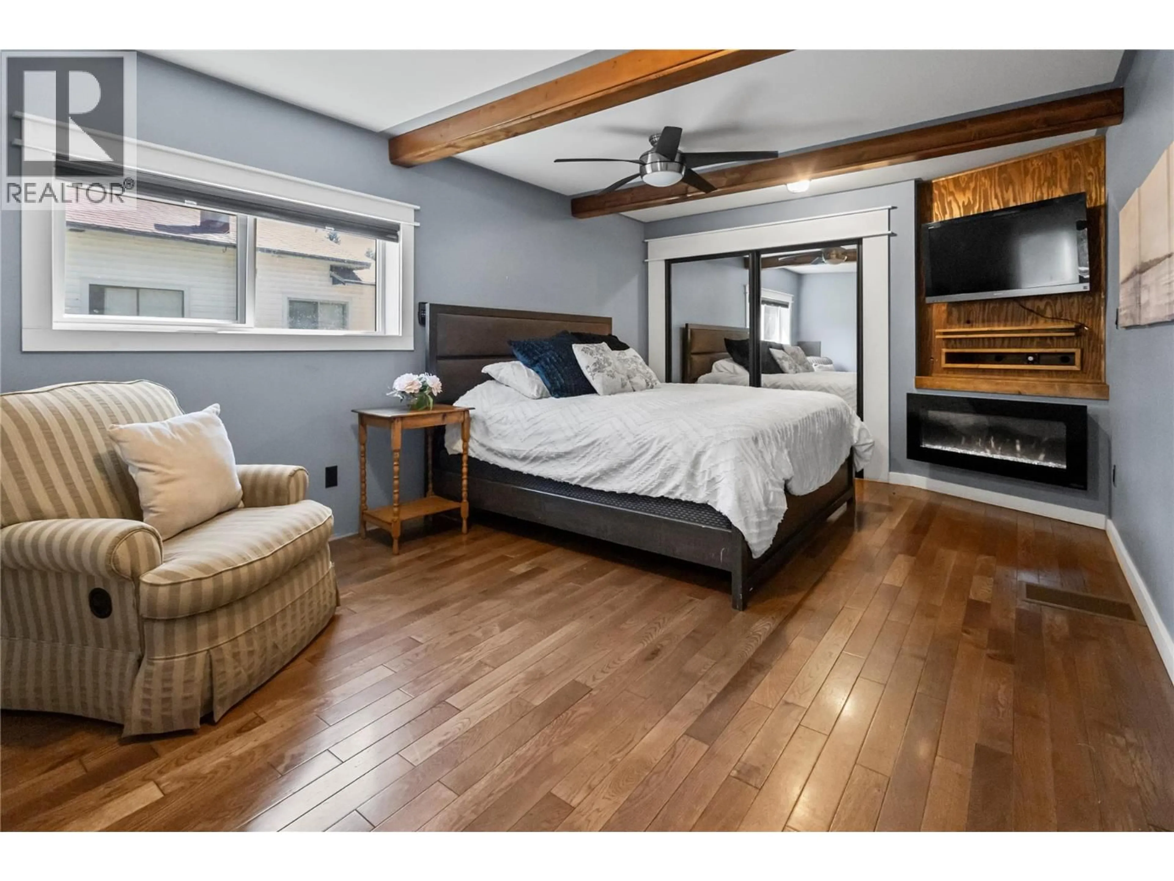 Bedroom with bed, wood/laminate floor for 1640 ODE ROAD, Christina Lake British Columbia V0H1E0