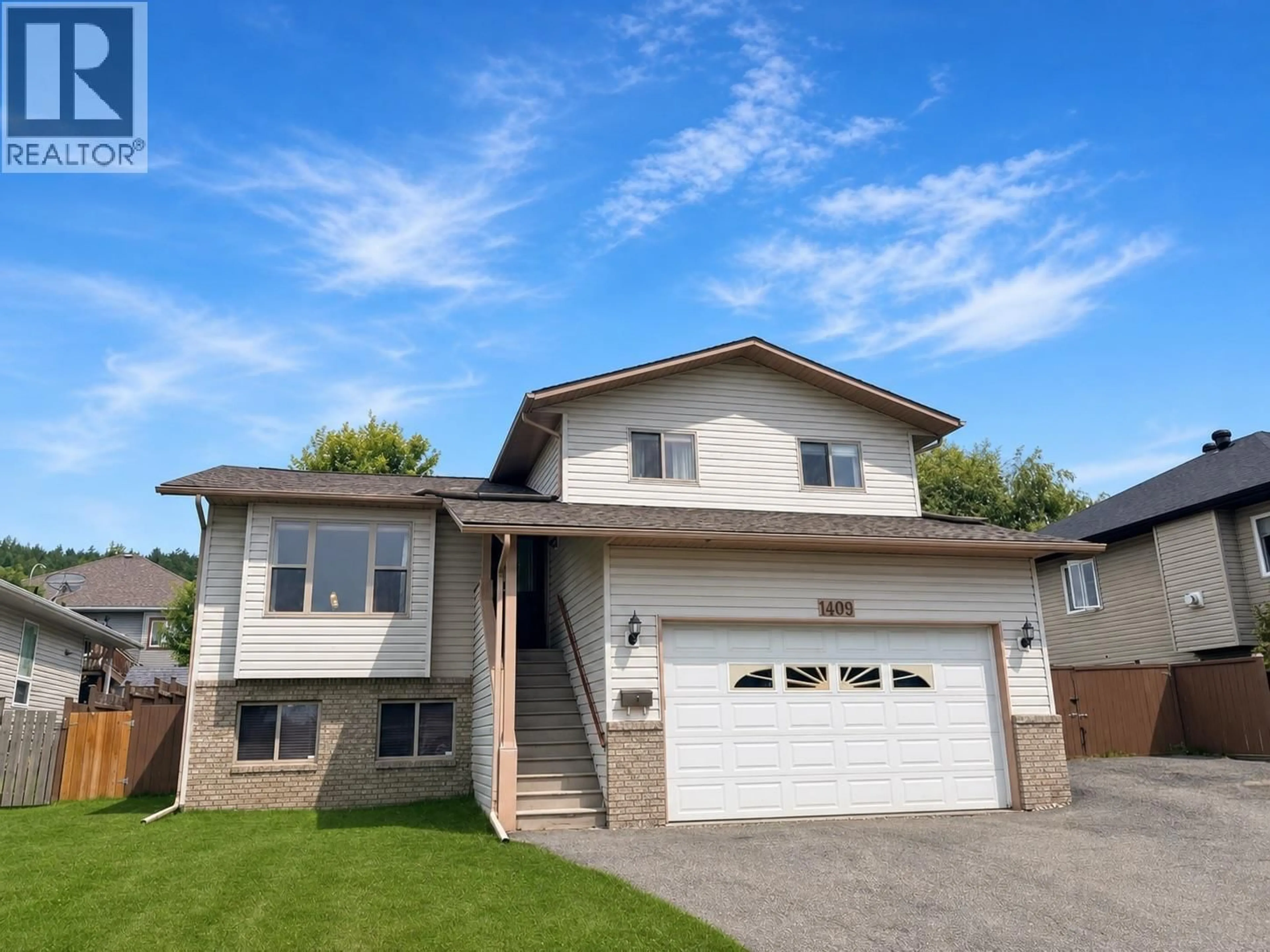 Home with vinyl exterior material, street for 1409 SOUTHVIEW DRIVE, Cranbrook British Columbia V1C6S1