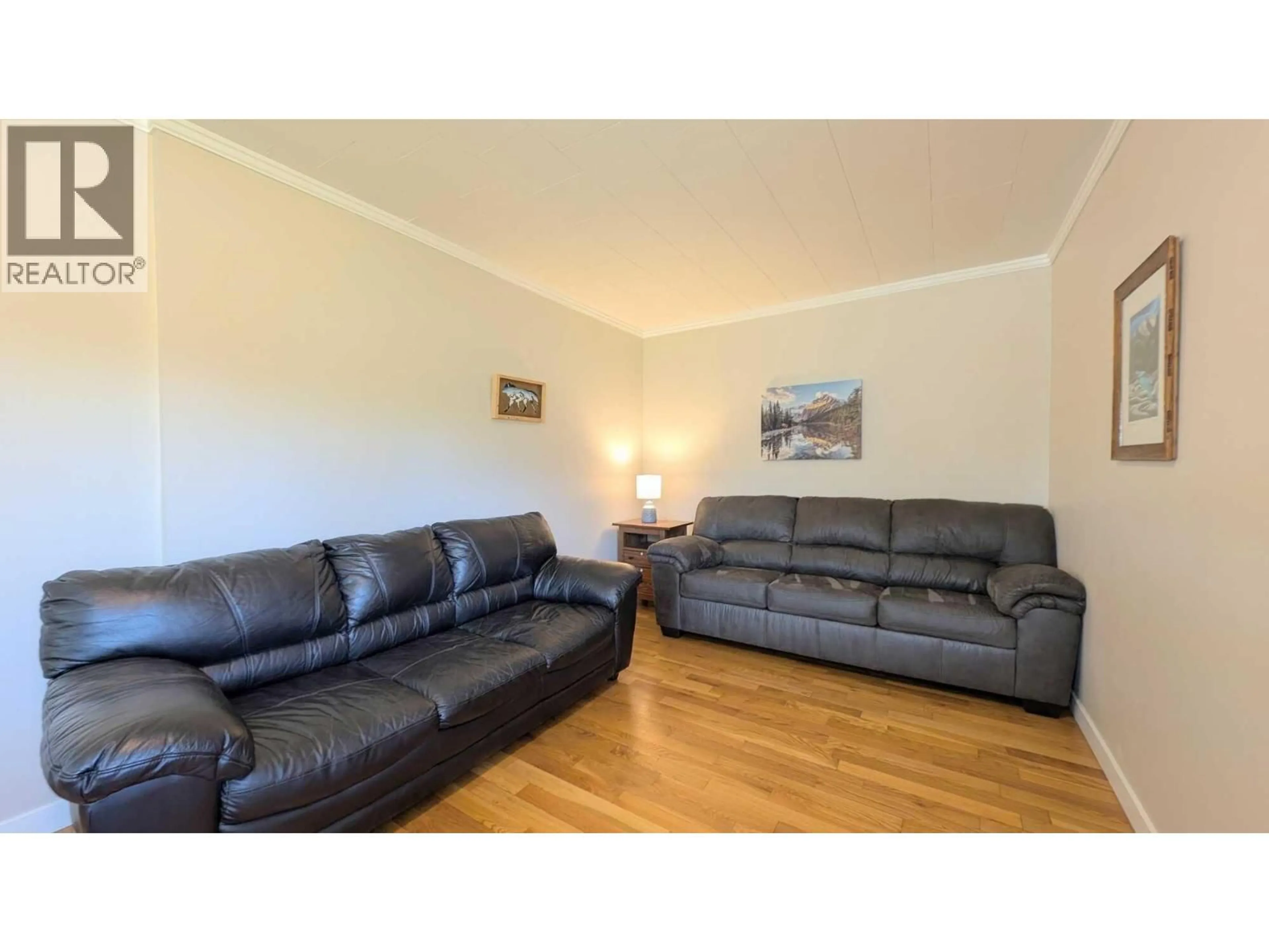 Living room with furniture, wood/laminate floor for 1345 POISSON ROAD, Kimberley British Columbia V1A3M9