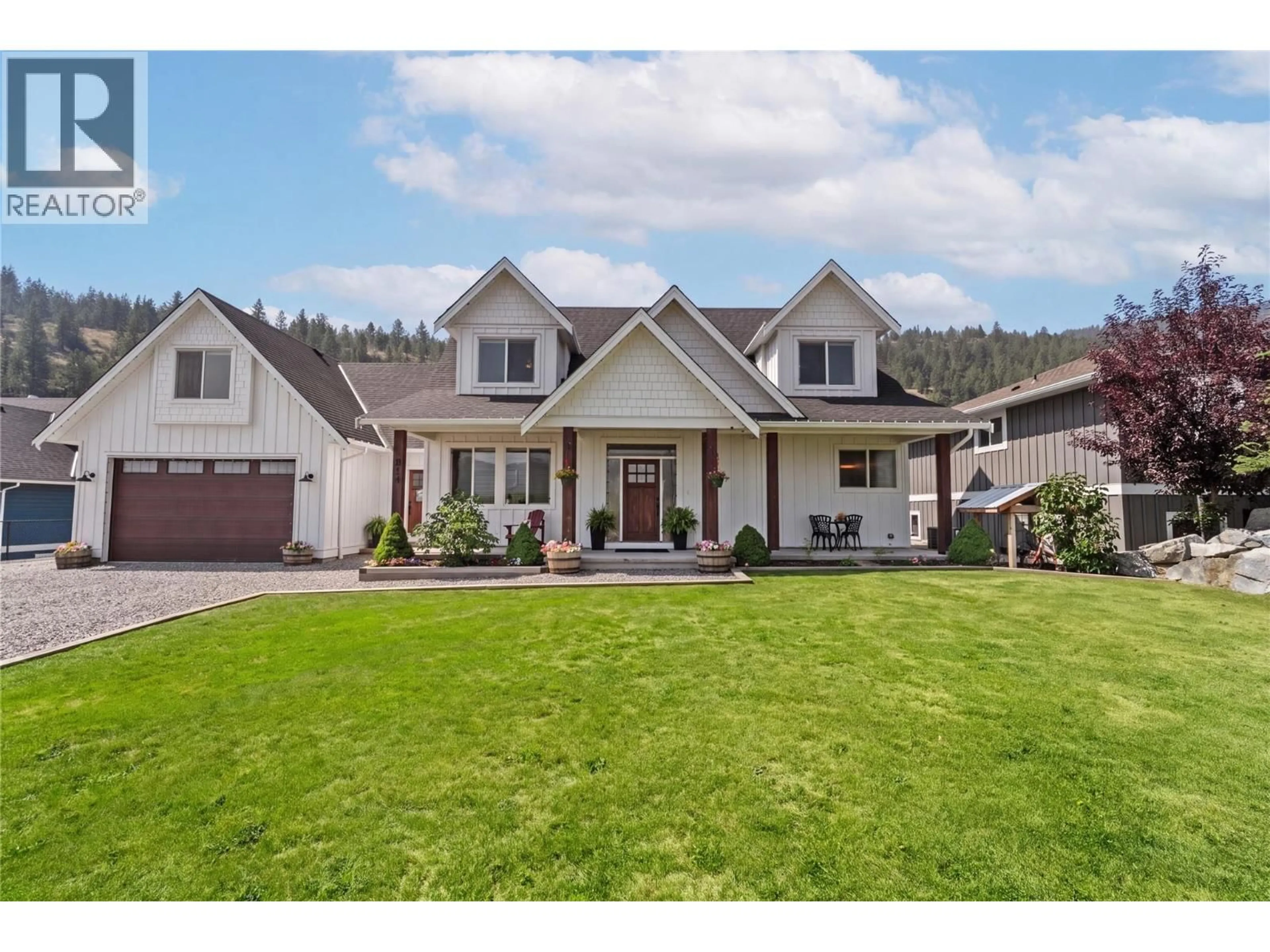 Home with vinyl exterior material, street for 310 LINDLEY CREEK ROAD, Merritt British Columbia V1K1L4