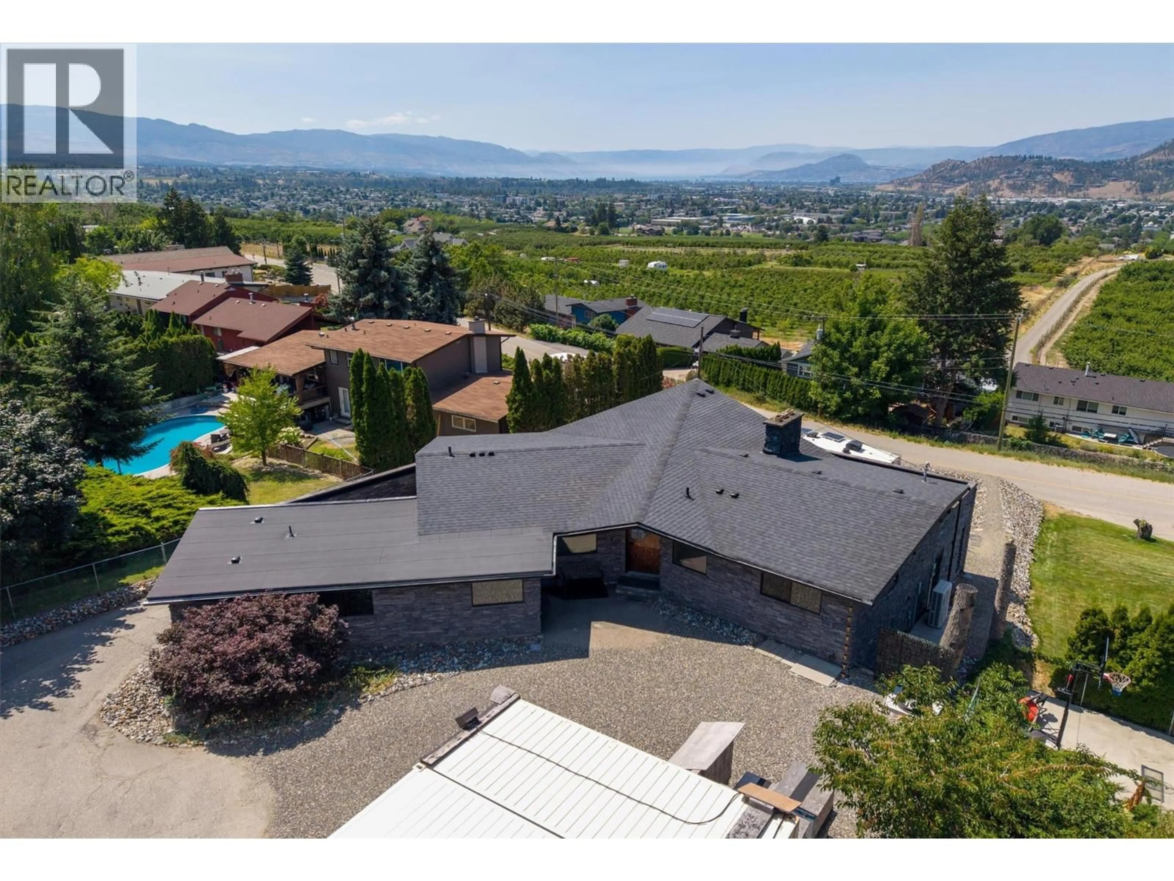 A pic from outside/outdoor area/front of a property/back of a property/a pic from drone, mountain view for 1165 GIBSON ROAD, Kelowna British Columbia V1P1B7