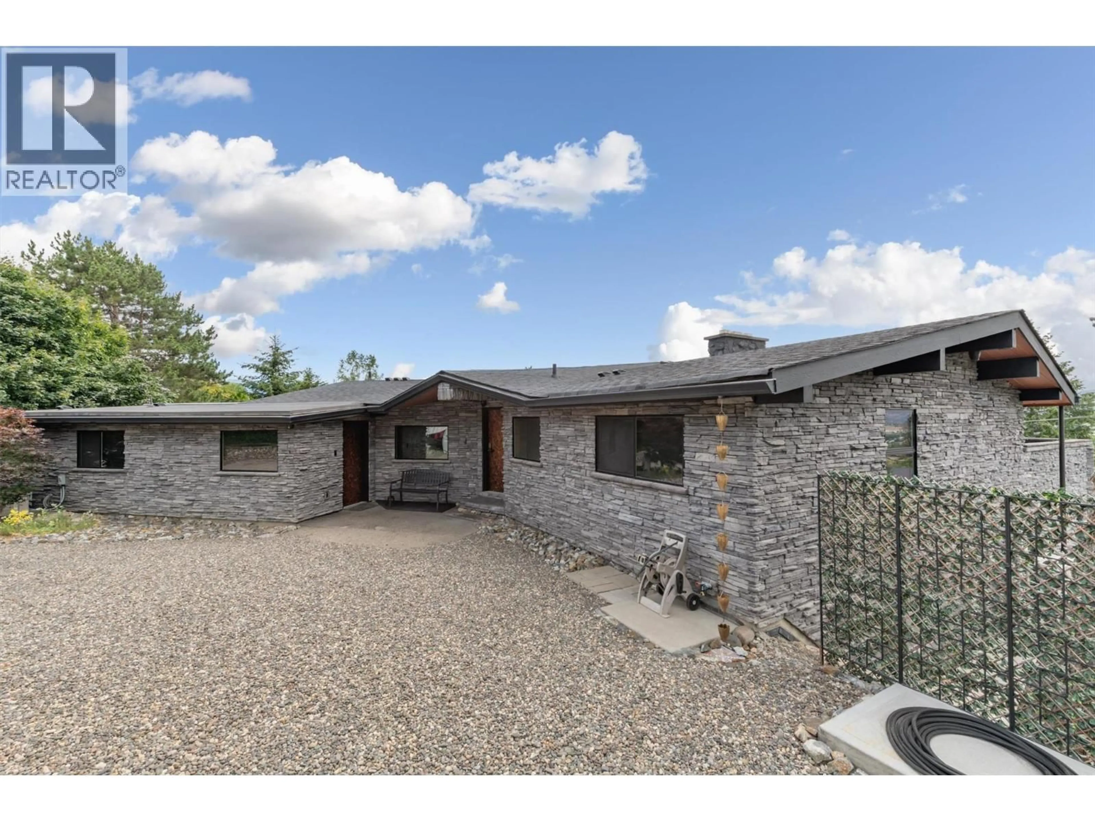 A pic from outside/outdoor area/front of a property/back of a property/a pic from drone, building for 1165 GIBSON ROAD, Kelowna British Columbia V1P1B7