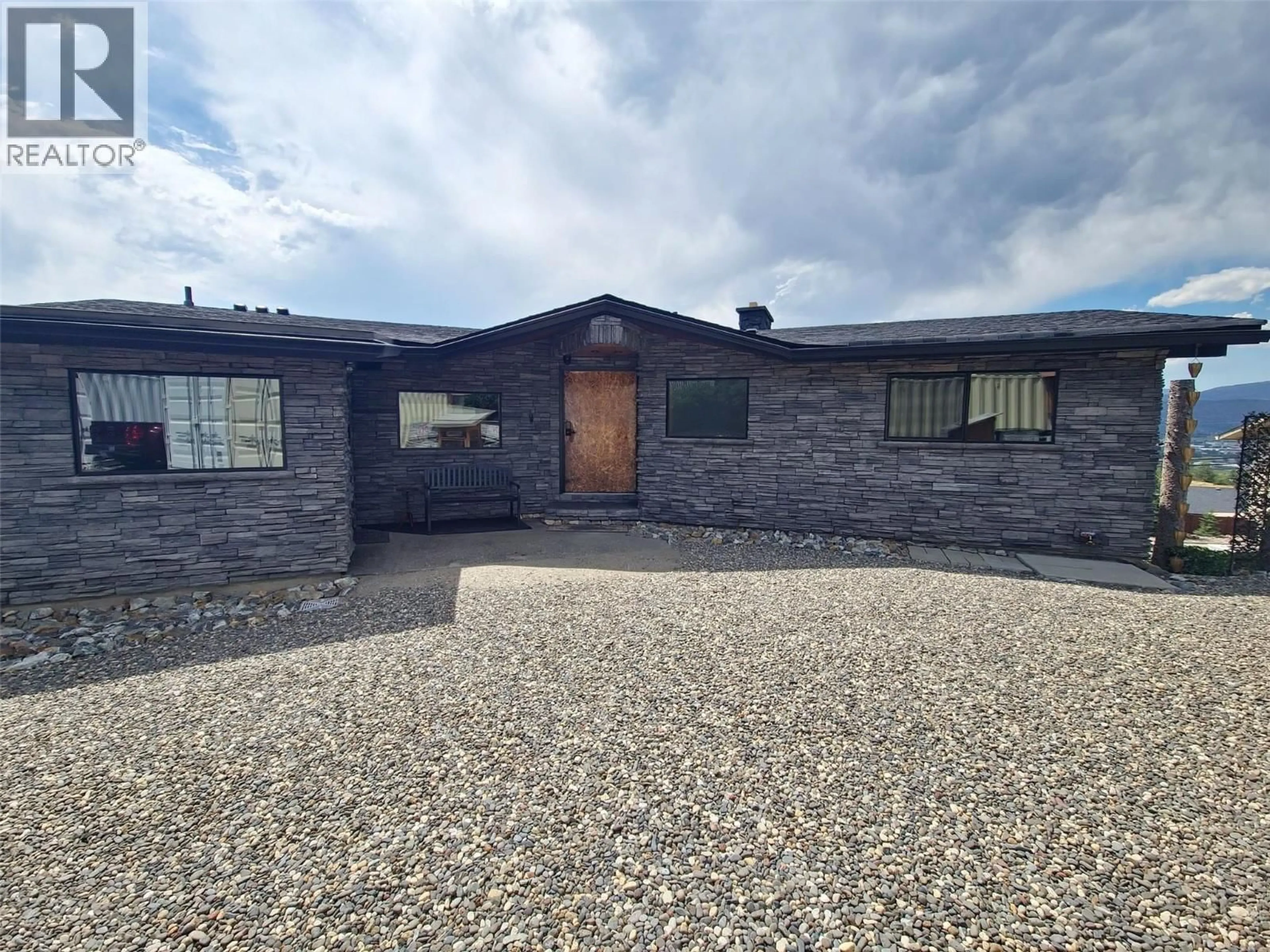 A pic from outside/outdoor area/front of a property/back of a property/a pic from drone, unknown for 1165 GIBSON ROAD, Kelowna British Columbia V1P1B7