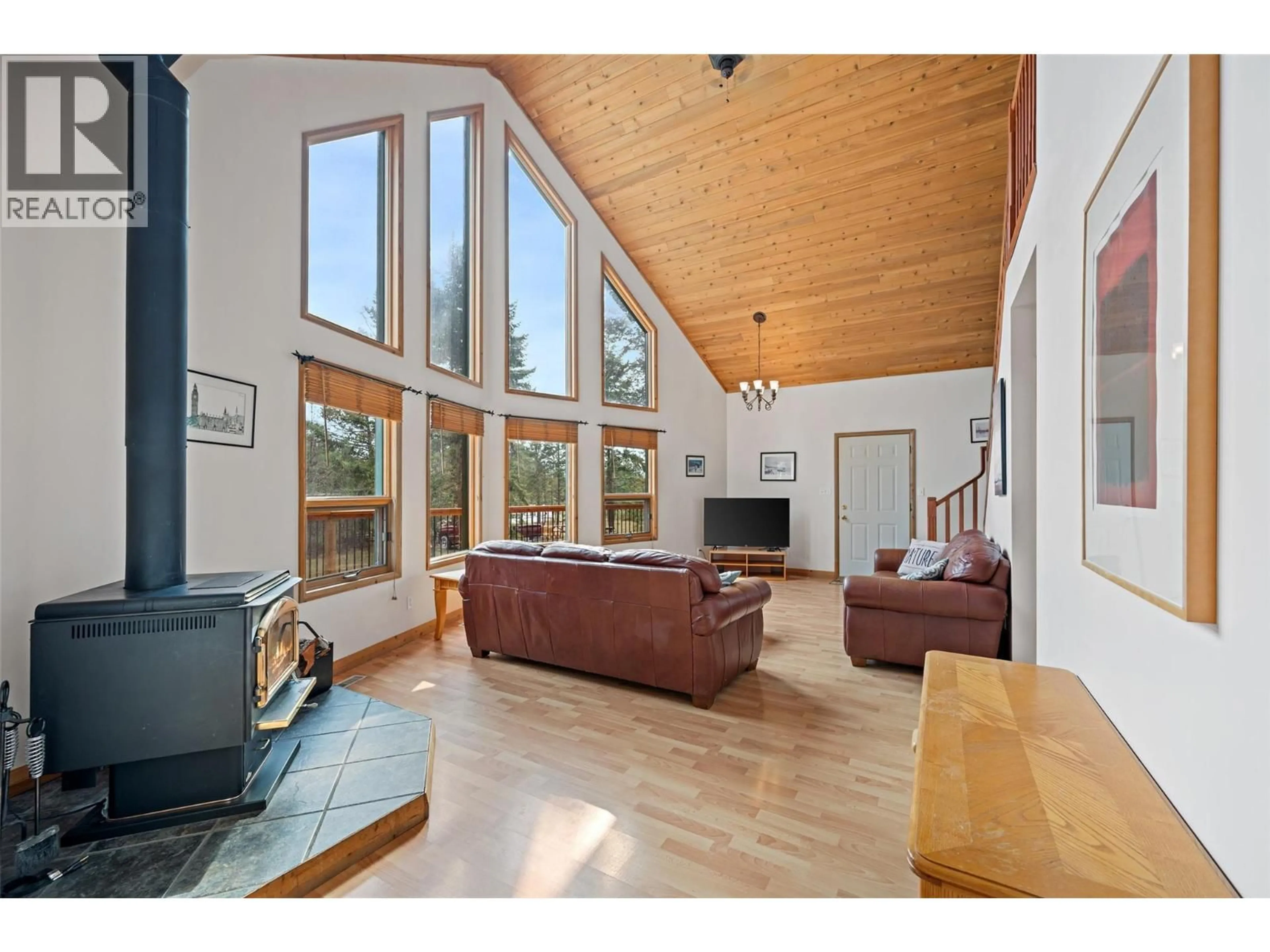Living room with furniture, wood/laminate floor for 4345 TEAL ROAD, Fairmont Hot Springs British Columbia V0B1L2
