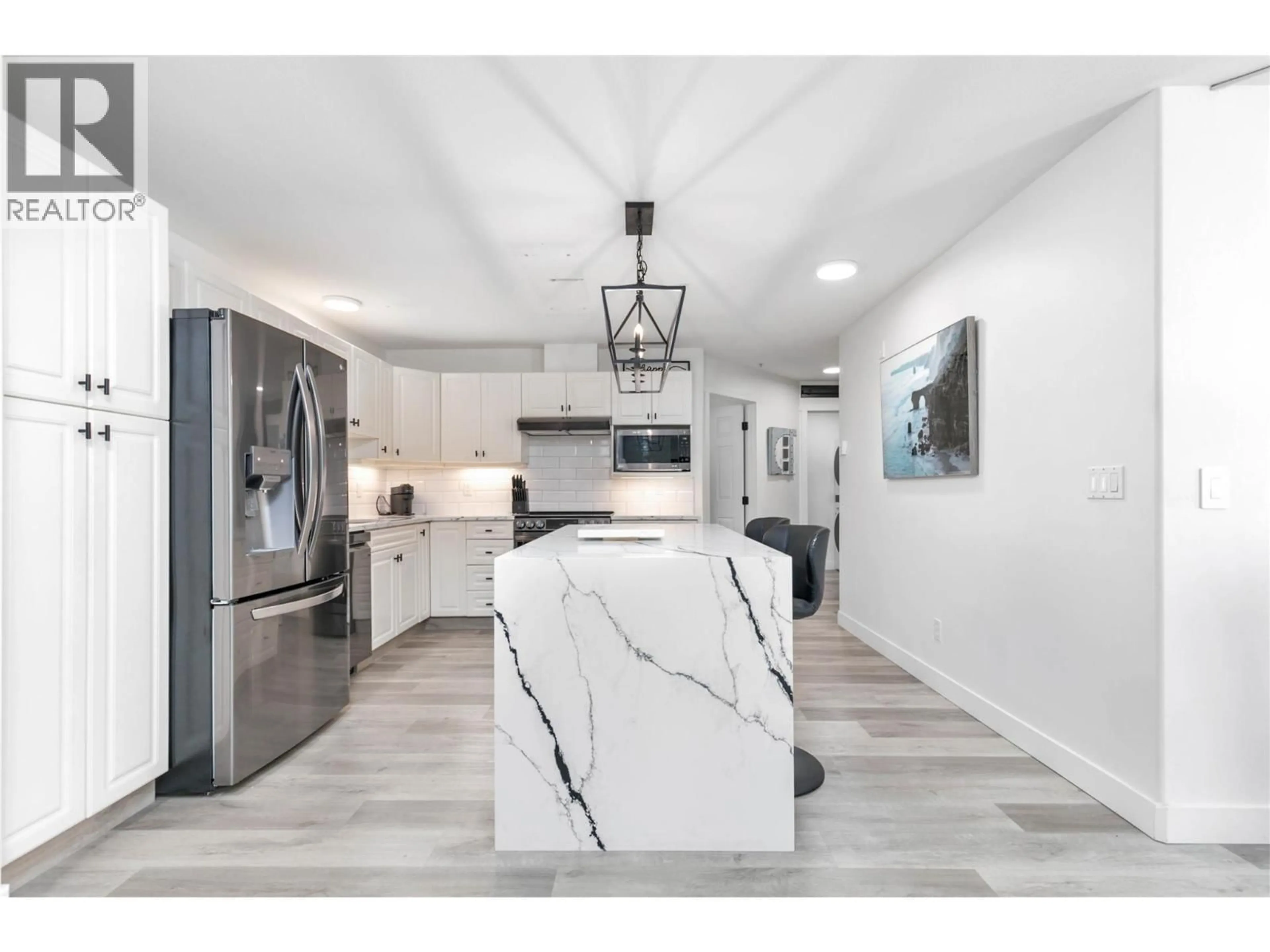 Open concept kitchen, ceramic/tile floor for 307 - 1950 DURNIN ROAD, Kelowna British Columbia V1X7W6