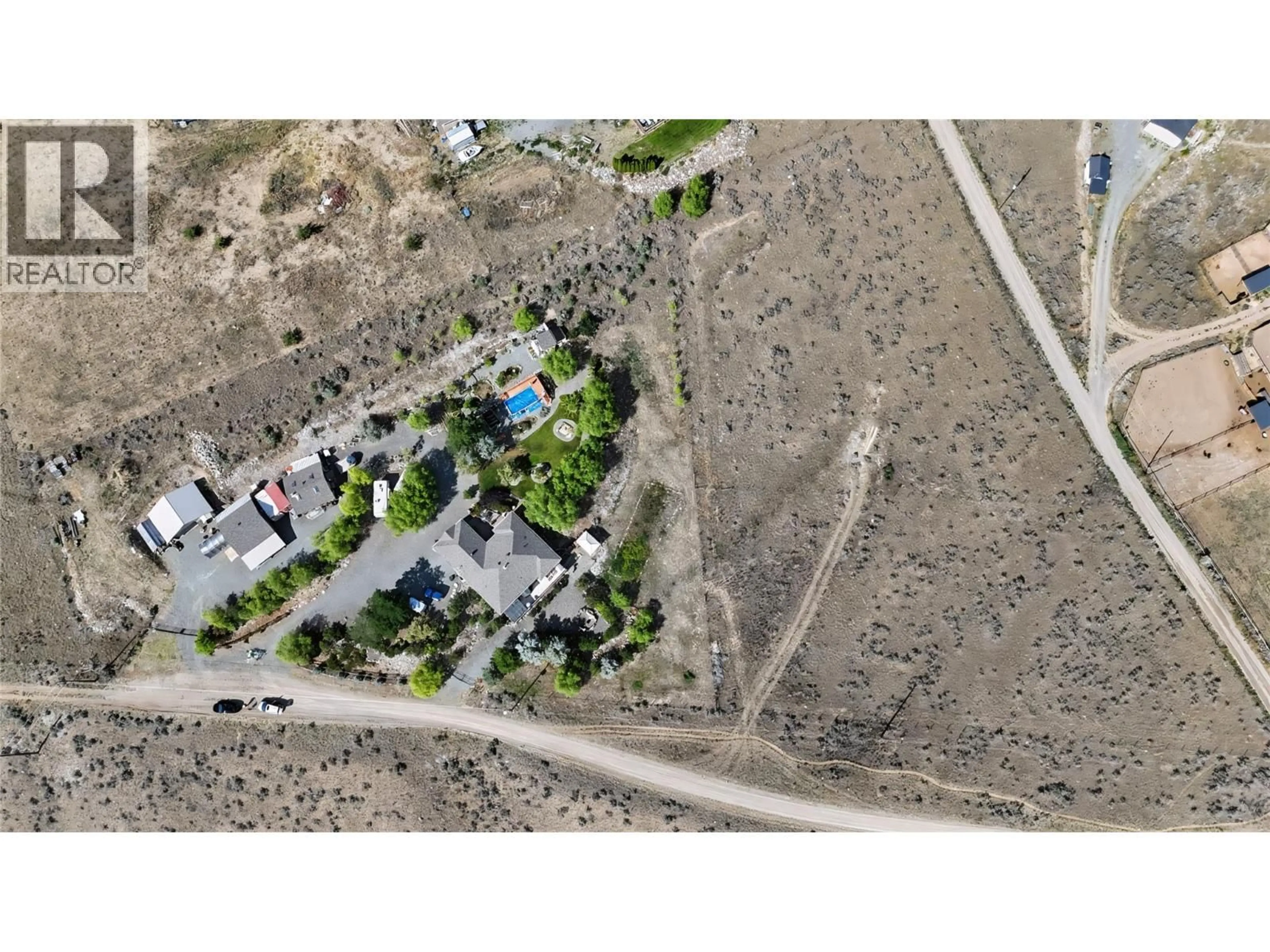 A pic from outside/outdoor area/front of a property/back of a property/a pic from drone, street for 6341 THOMPSON RIVER DRIVE WEST, Kamloops British Columbia V0K2P0